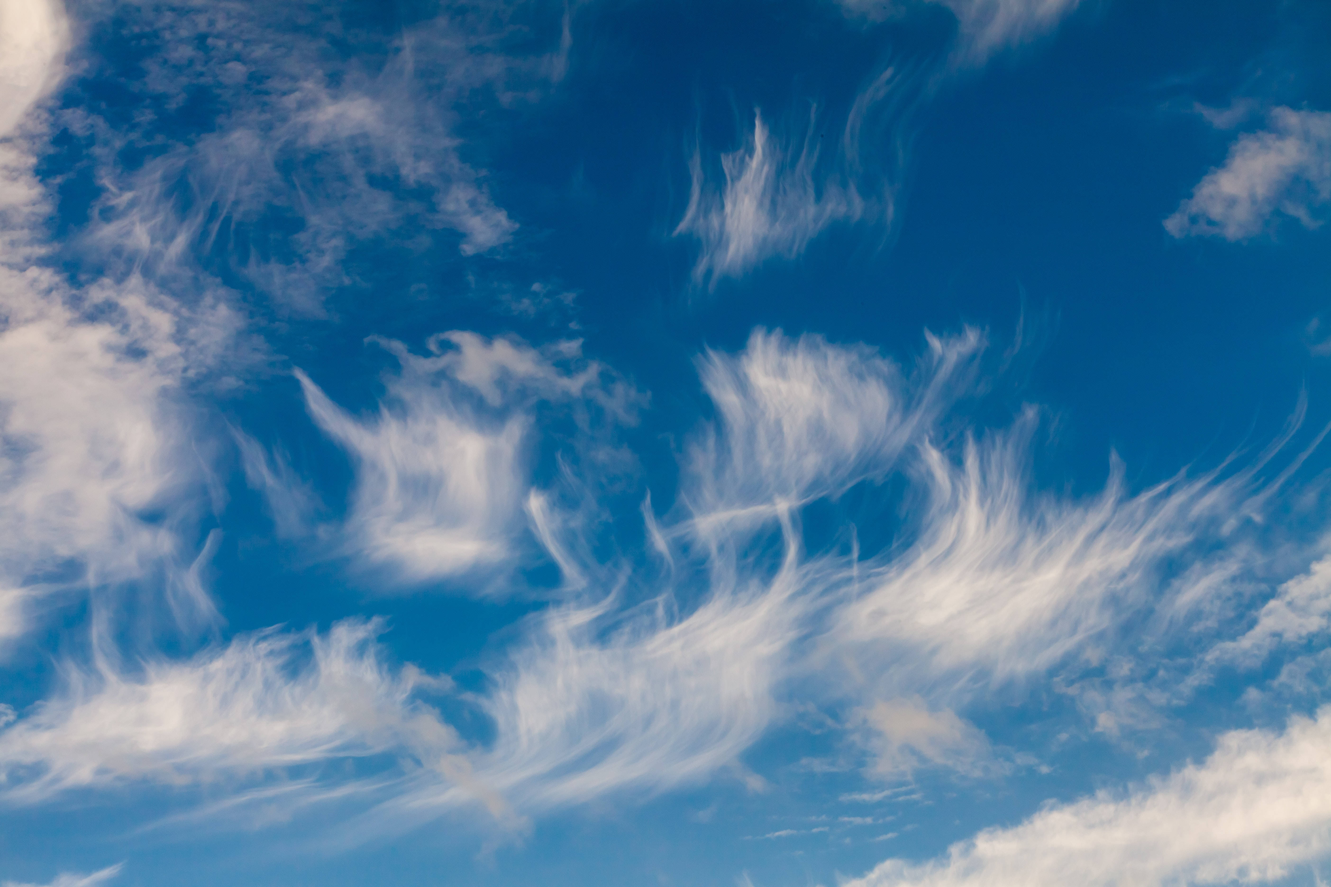 feathery delicate blue aesthetic cloud, vibrant blue sky, wispy white cirrus clouds, 5K Desktop Wallpaper
