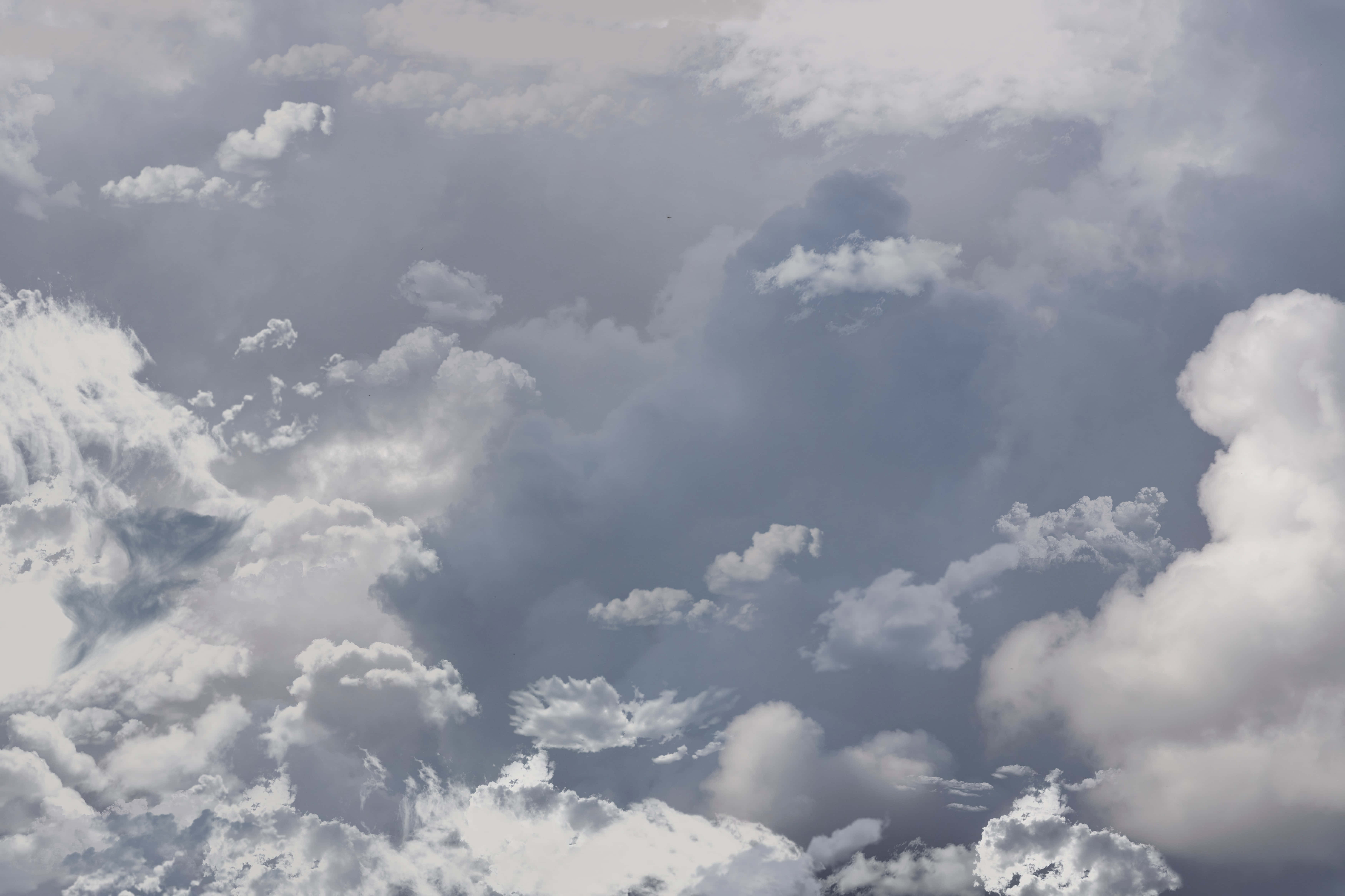 blue sky, fluffy white clouds, moody gray backdrop, 5K Desktop Wallpaper