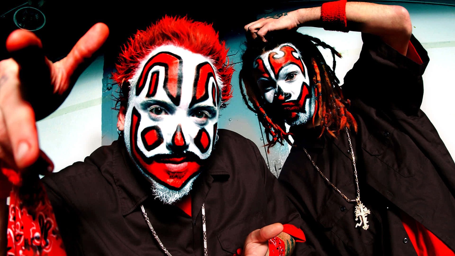 clown painted duo performers, red white and black face paint, dark background, Full HD Desktop Wallpaper