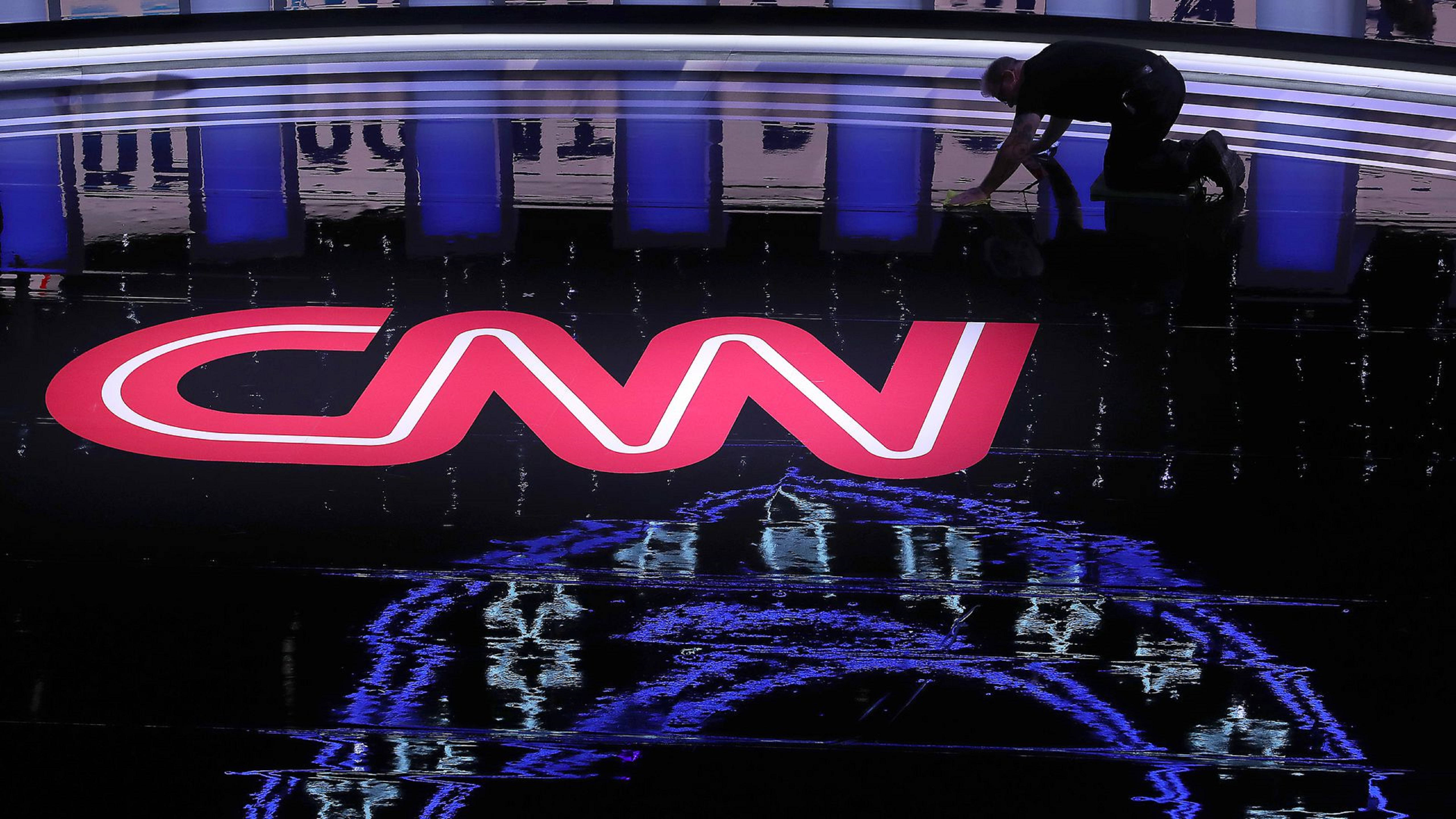 CNN, glossy black floor, glowing red CNN logo, 5K Desktop Wallpaper