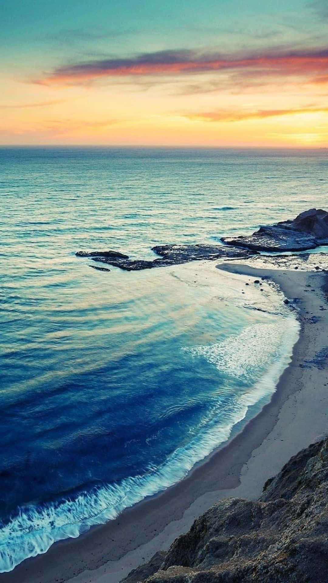 Sunset, sandy beach, rugged cliffs, Full HD Phone Wallpaper