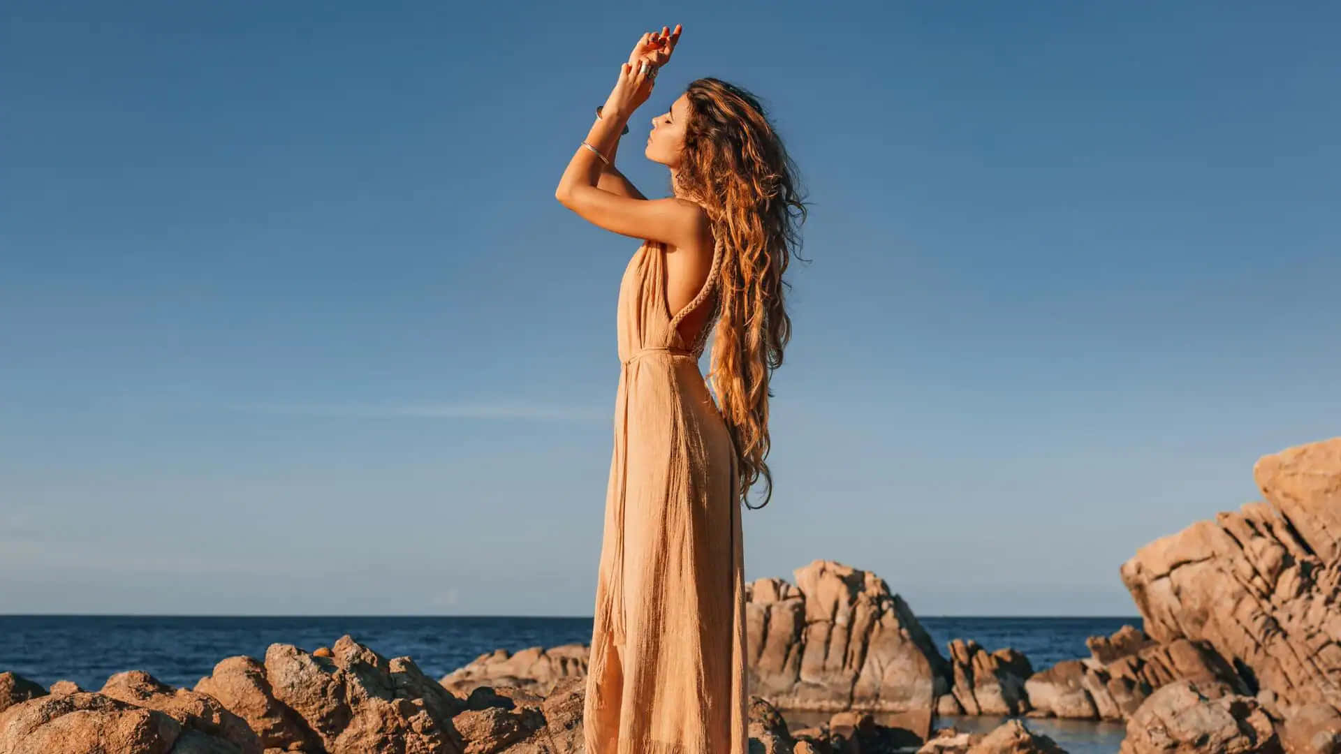 Coastal Granddaughter, beige dress, rocky shores, Full HD Desktop Wallpaper