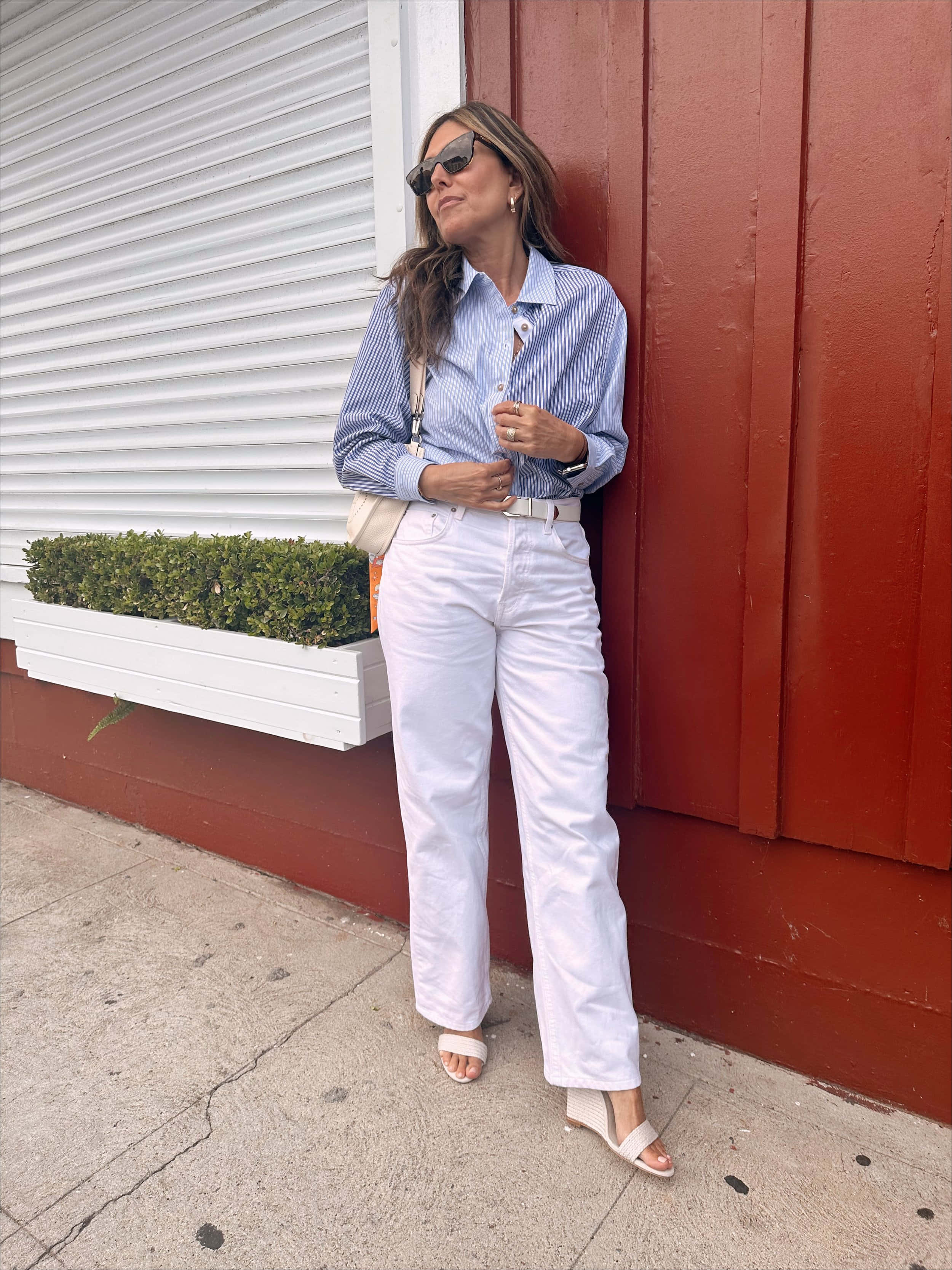 blue striped shirt, white jeans, red wall, 2K Phone Wallpaper