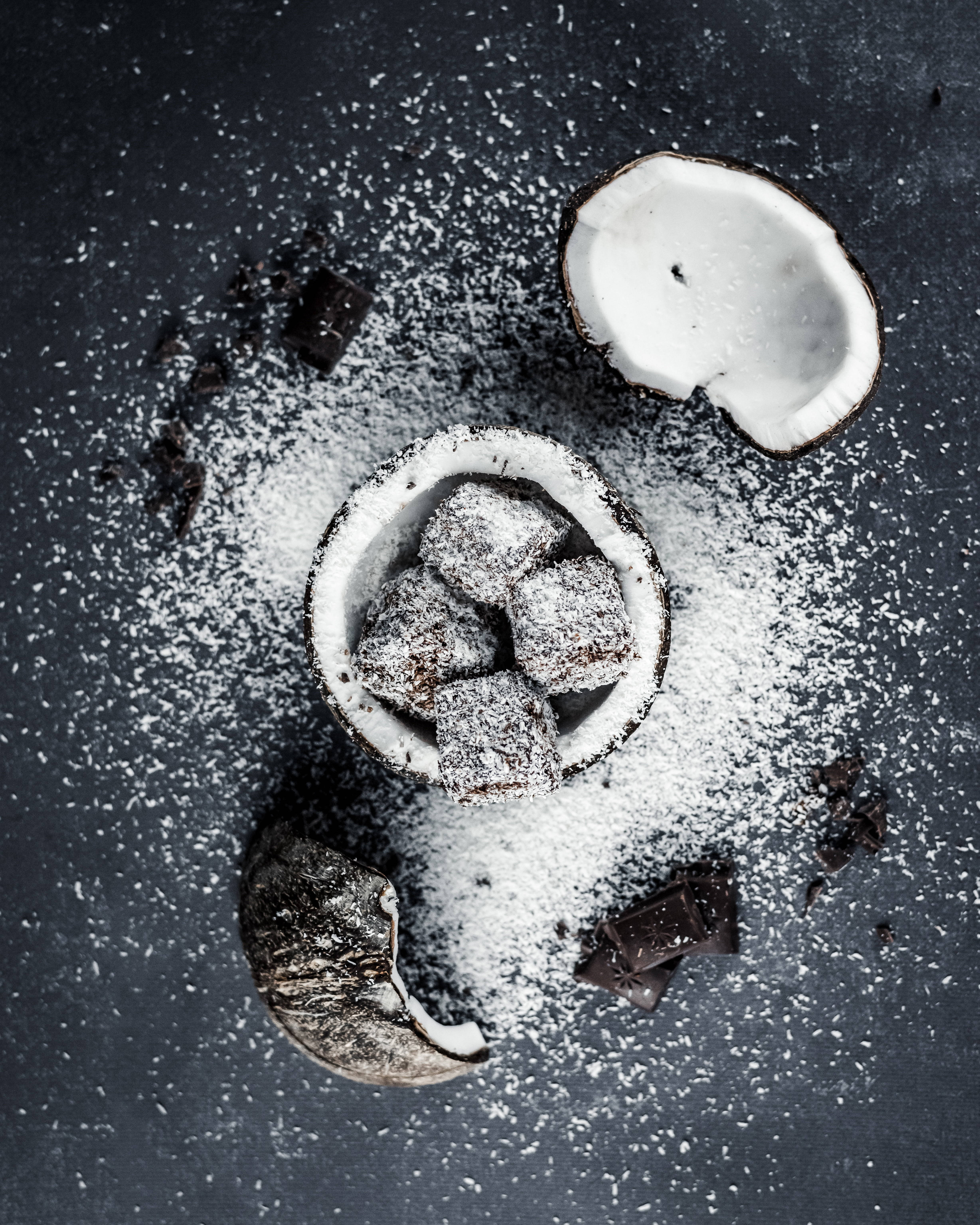 broken coconut fruit, coconut halves, chocolate cubes, 5K Phone Wallpaper