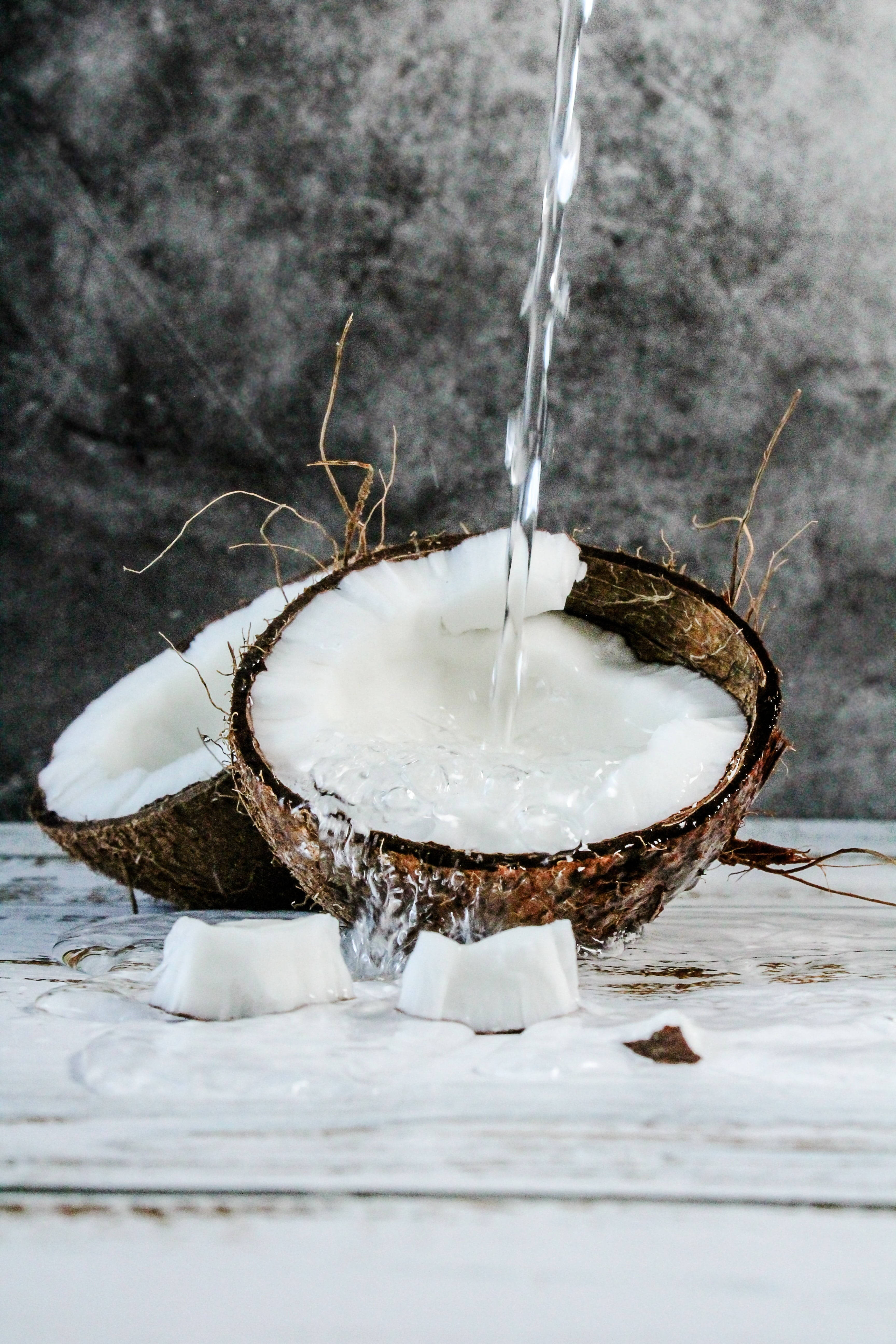 coconut water, cracked open coconut, weathered white wooden surface, 5K Phone Wallpaper