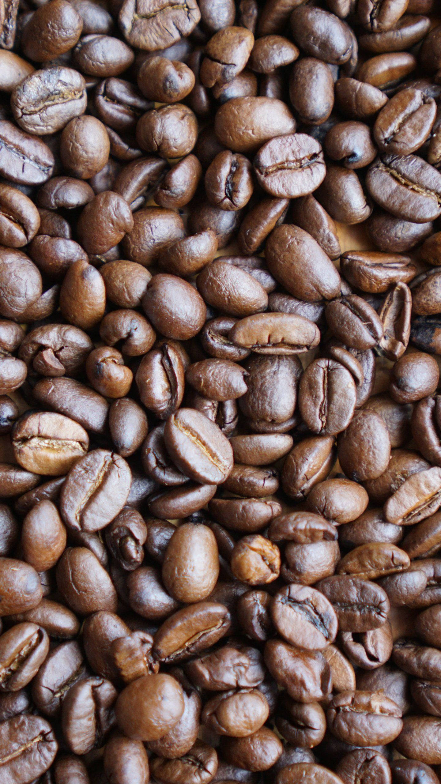 light roasted coffee beans, rich brown tones, textured surfaces, 2K Phone Wallpaper