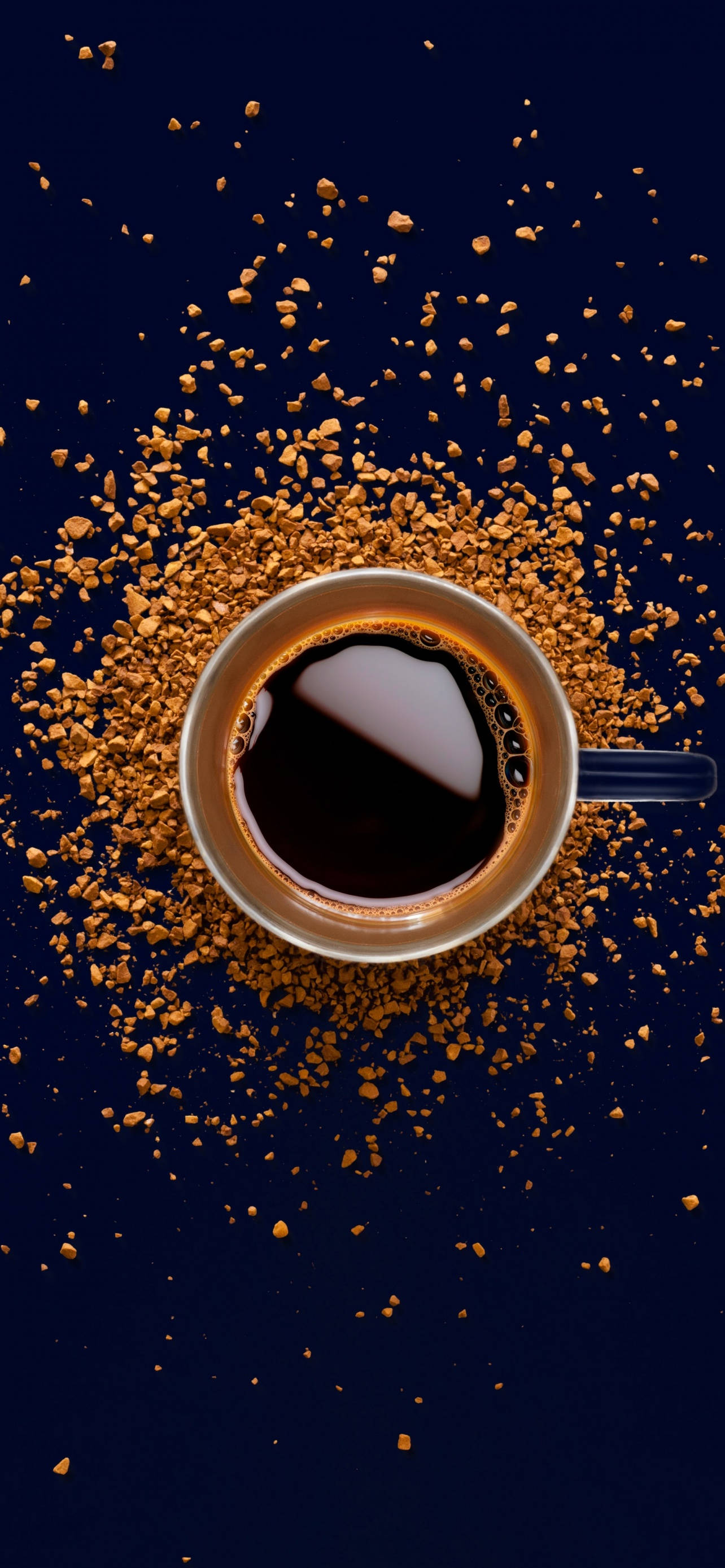 coffee cup, golden-brown coffee grounds, deep navy background, 2K Phone Wallpaper