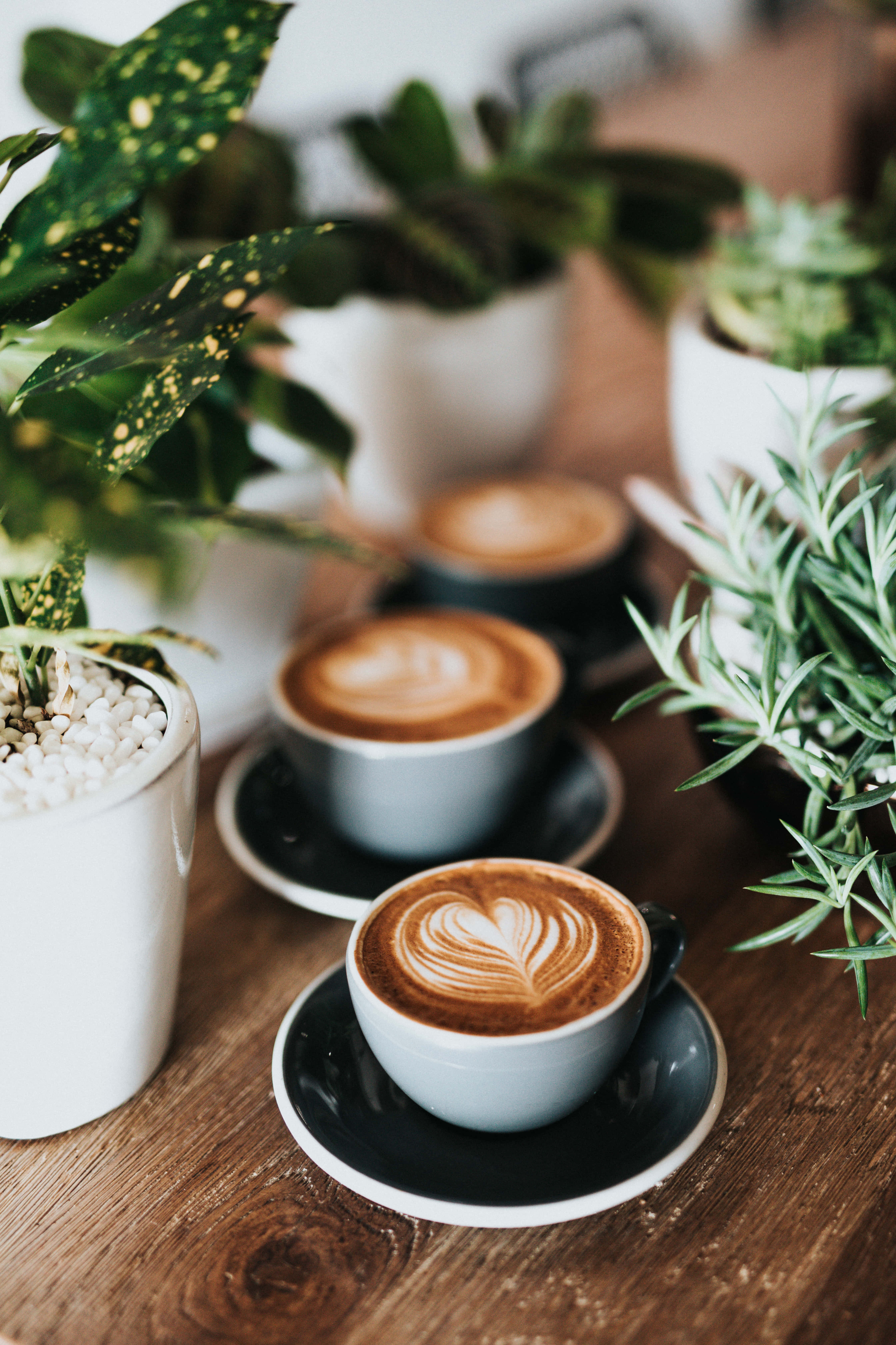 cup of latte art, heart designs, wooden table, 5K Phone Wallpaper