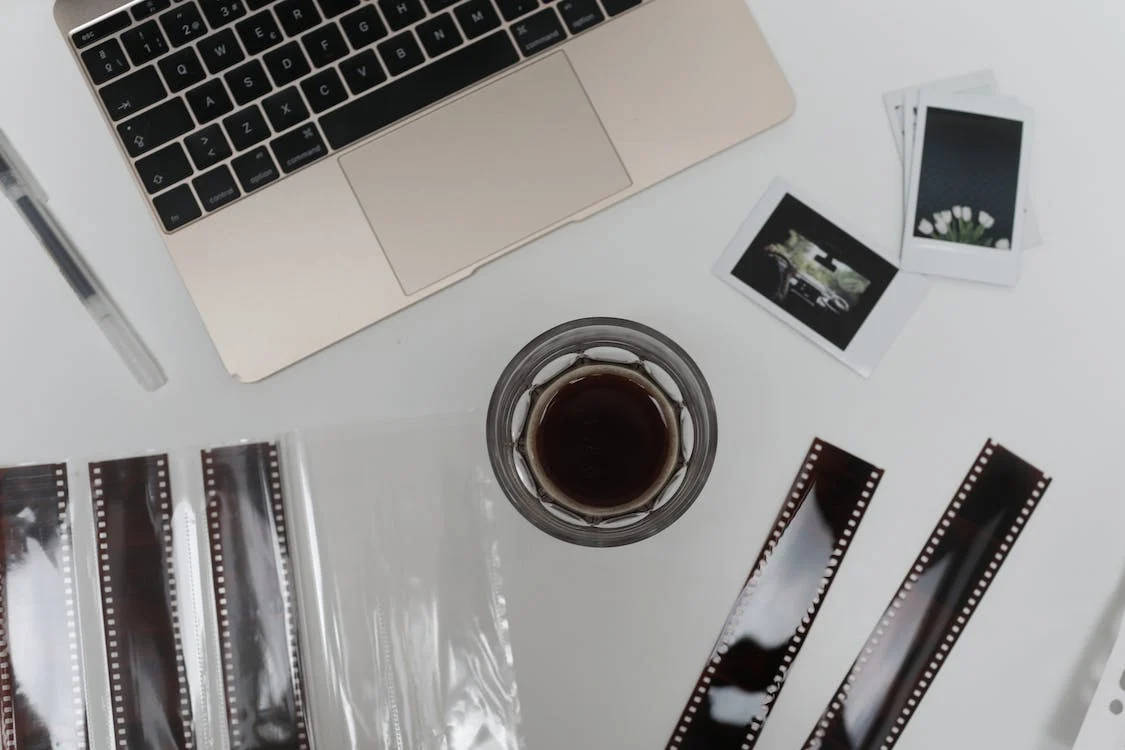 laptop, coffee cup, film strips, SD Desktop Wallpaper