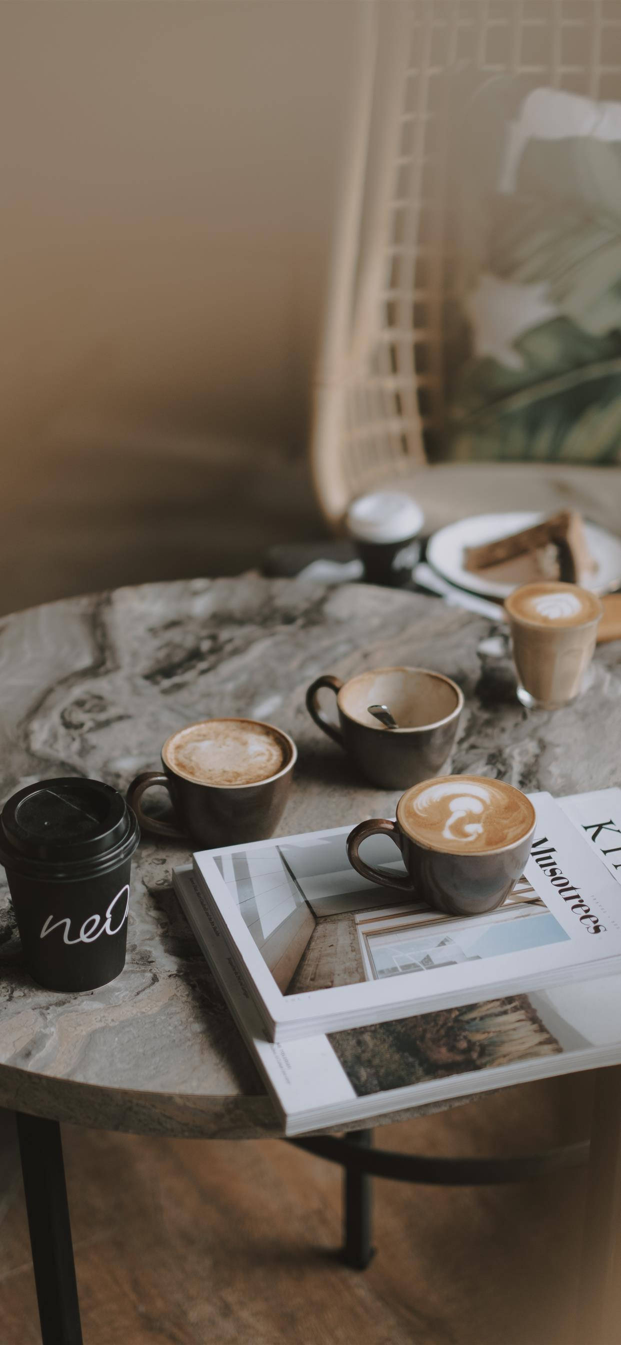 cozy café scene, steaming coffee cups, magazine, 2K Phone Wallpaper