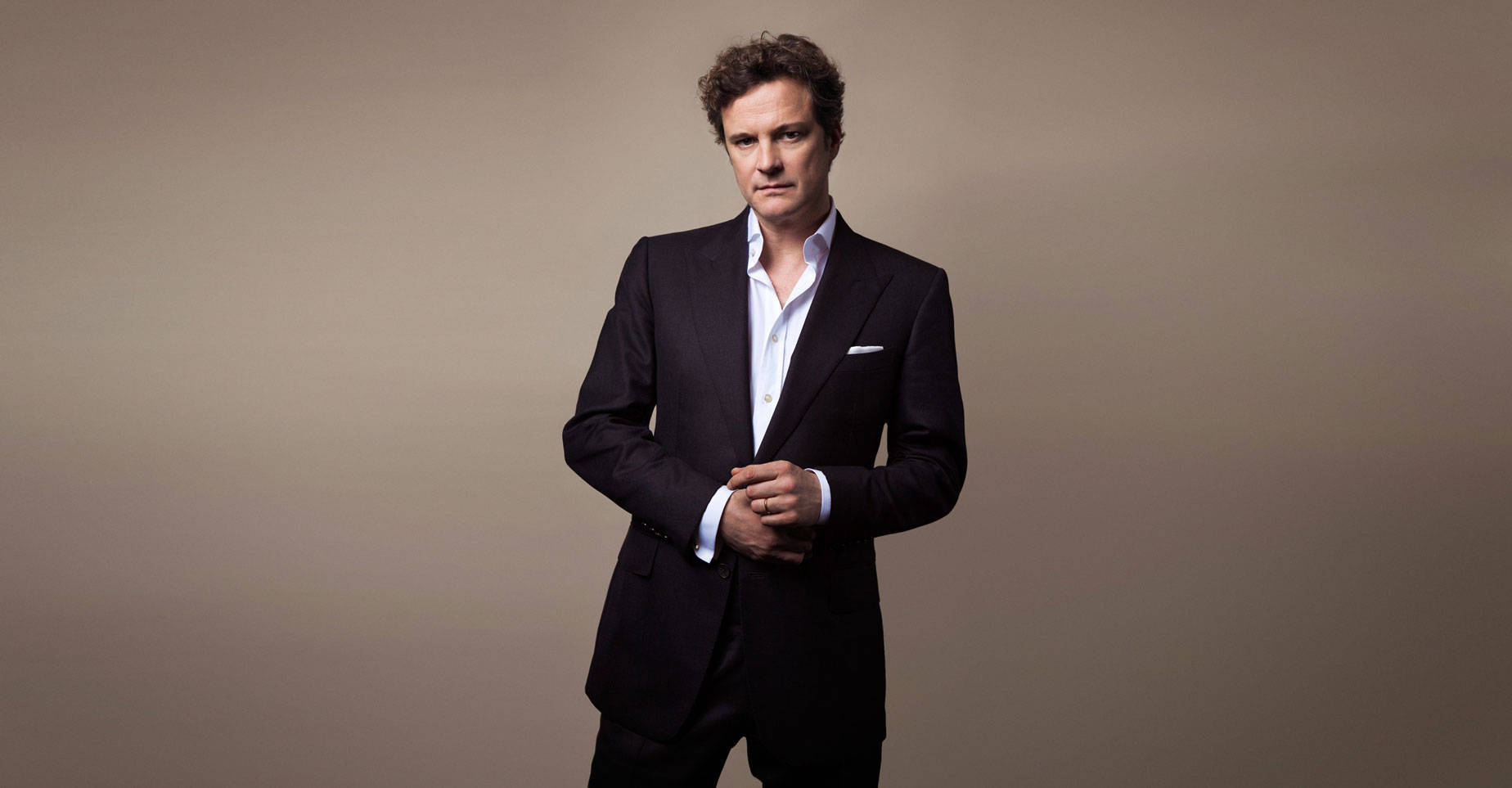 Colin Firth, black suit, muted beige backdrop, HD Desktop Wallpaper