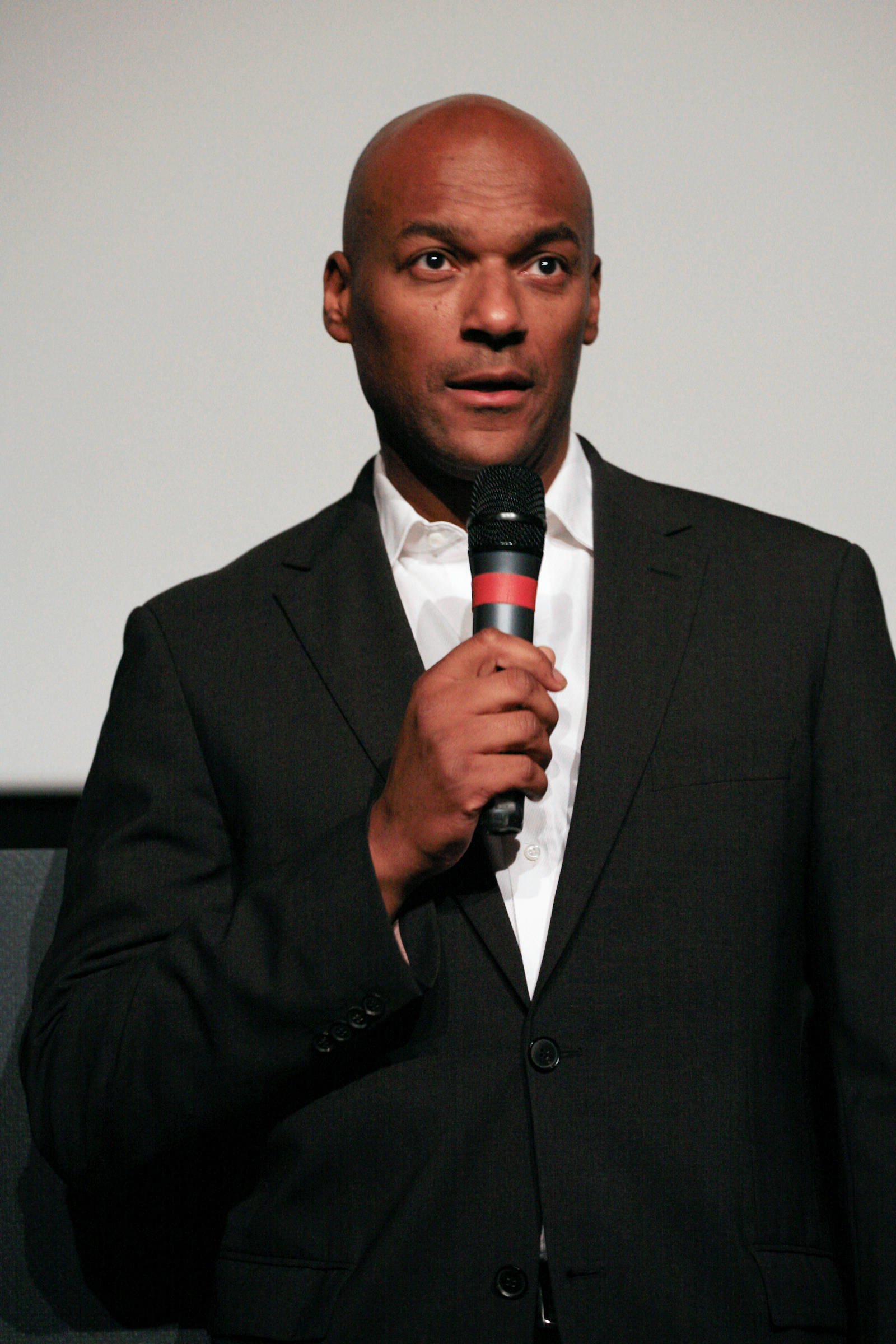 Colin Salmon, black suit, microphone, Full HD Phone Wallpaper