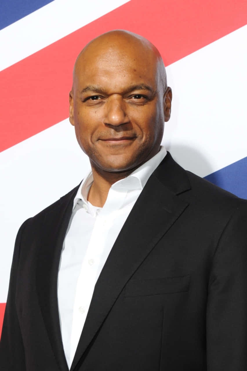 Colin Salmon, red white and blue diagonal striped backdrop, black suit, HD Phone Wallpaper