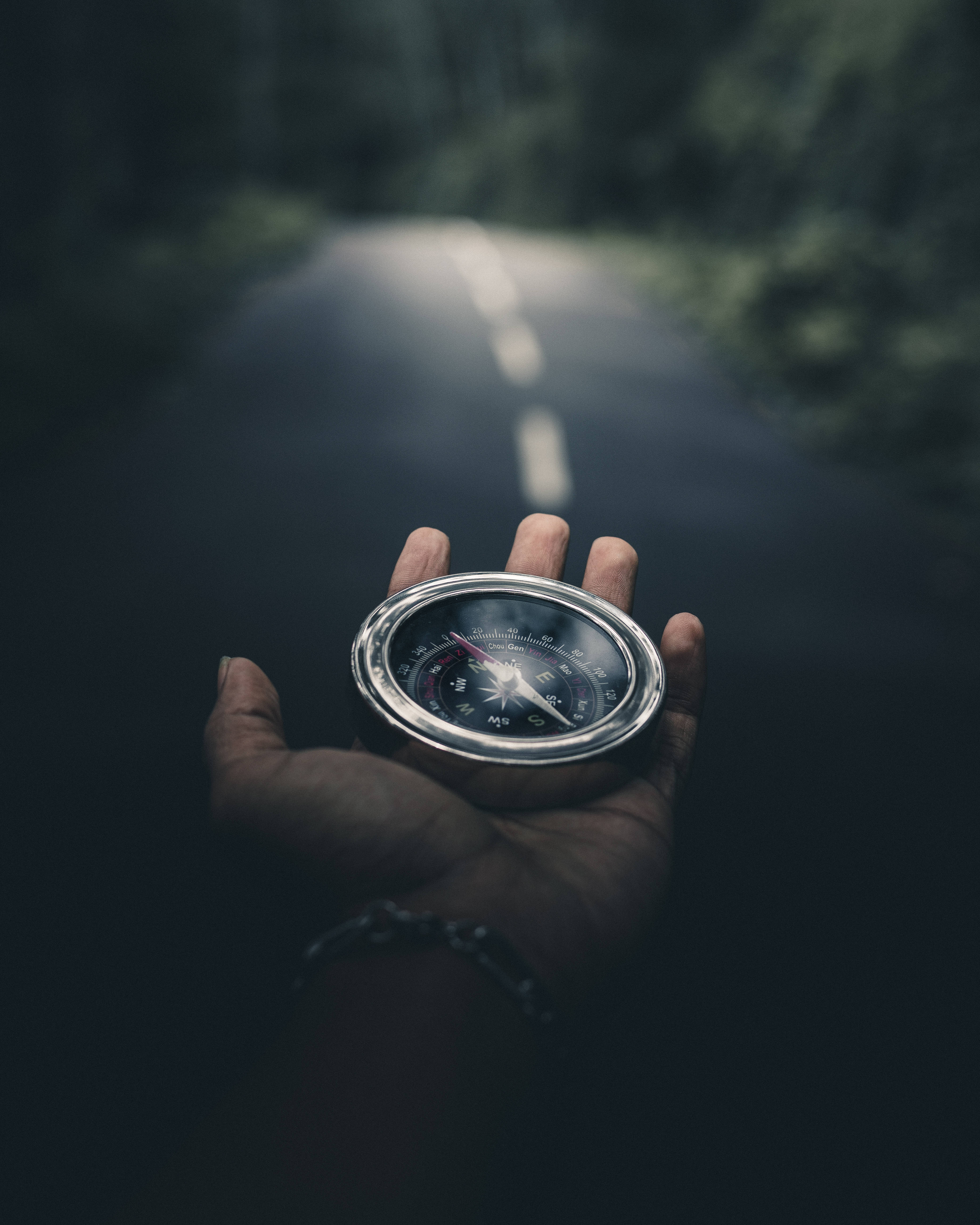 Heavy Vignette Metal Compass, silver compass, dimly lit forest road, 5K Phone Wallpaper