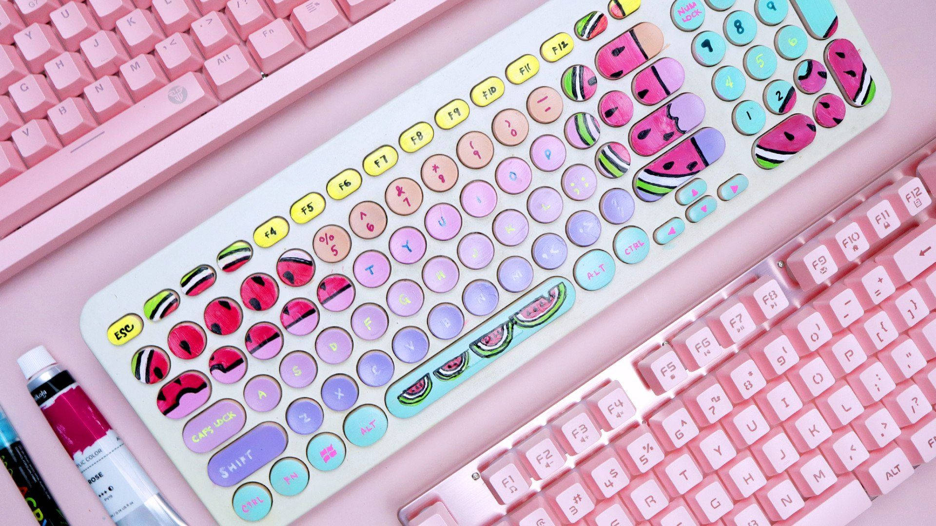 pastel pink computer keyboard, watermelon-themed keycaps, pink surface, Full HD Desktop Wallpaper
