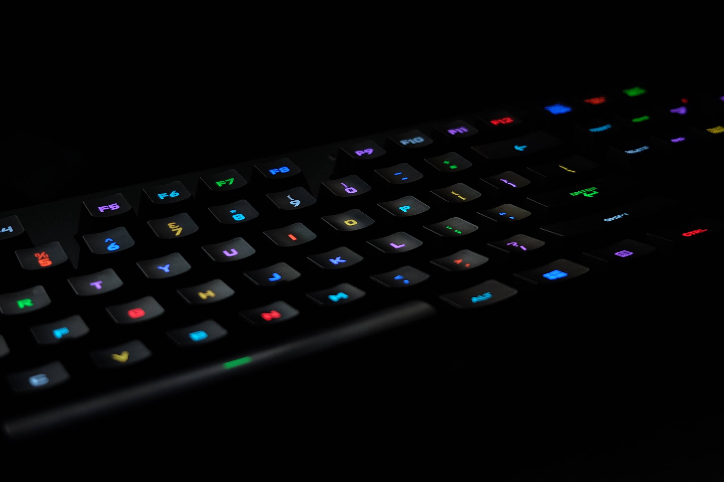 black gaming keyboard, vibrant rainbow backlighting, dark background, Full HD Desktop Wallpaper