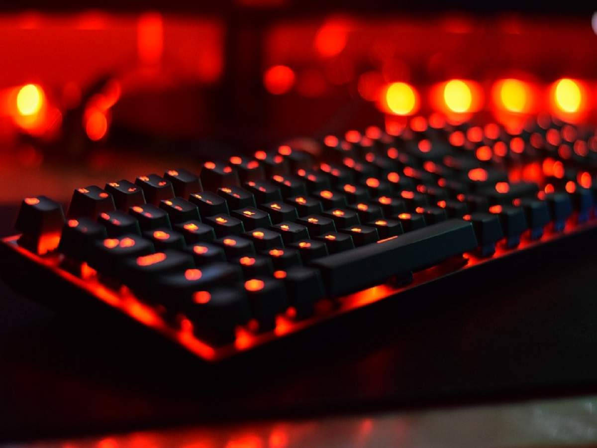 black mechanical keyboard, vibrant red backlighting, blurred red background, SD Desktop Wallpaper