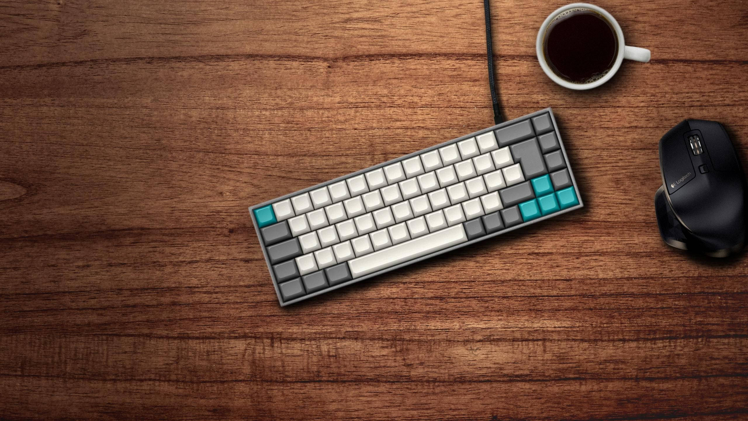 teal accent keys, rich wooden desk, black mouse, 2K Desktop Wallpaper