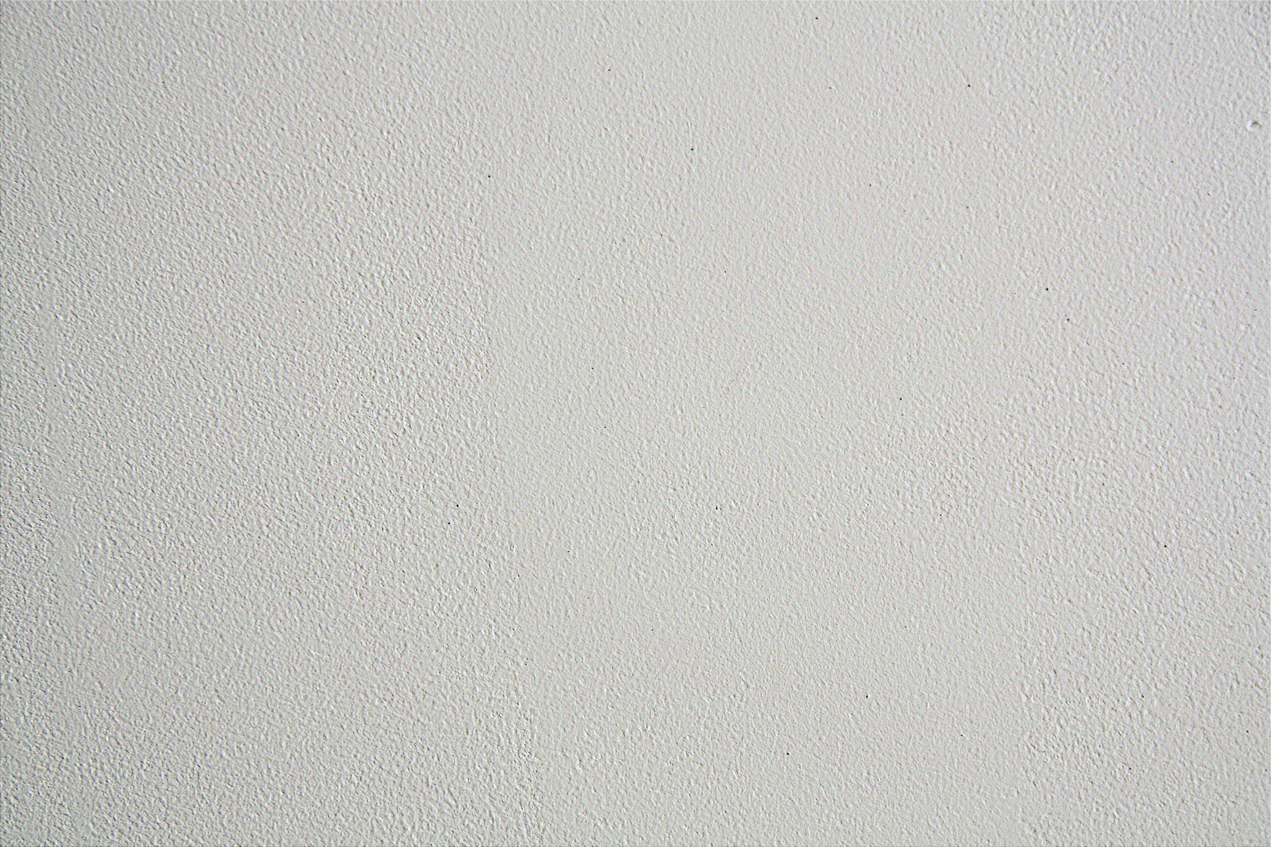 smooth grey concrete texture, smooth white textured wall surface, subtle grain, 4K Desktop Wallpaper