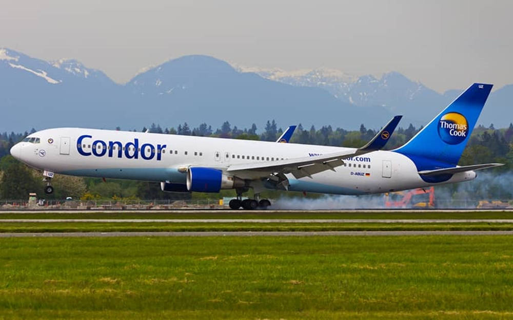 Condor Airlines, blue airplane tail, snow-capped mountains, SD Desktop Wallpaper