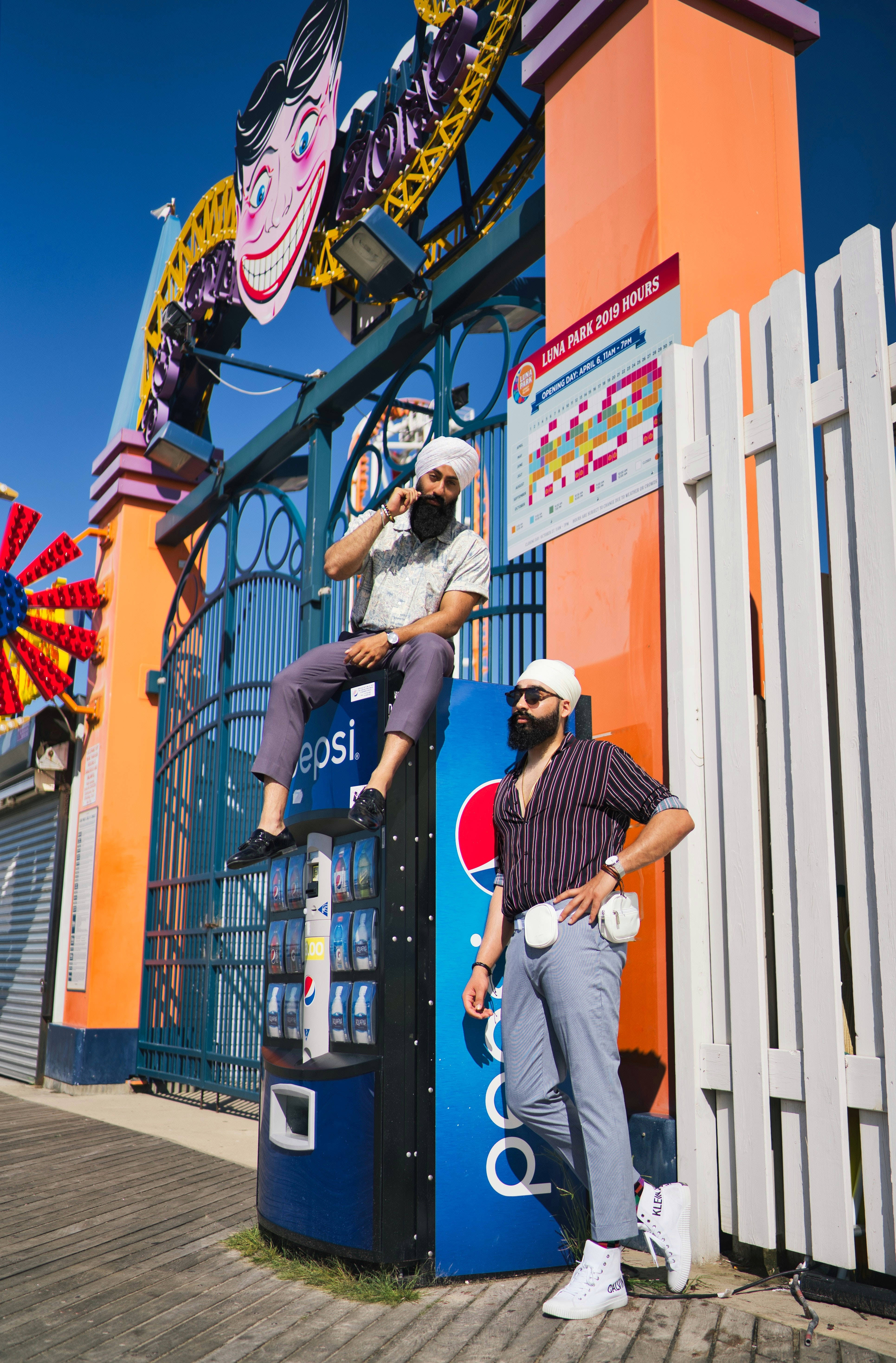 Coney Island, amusement park entrance, bright blue skies, 5K Phone Wallpaper
