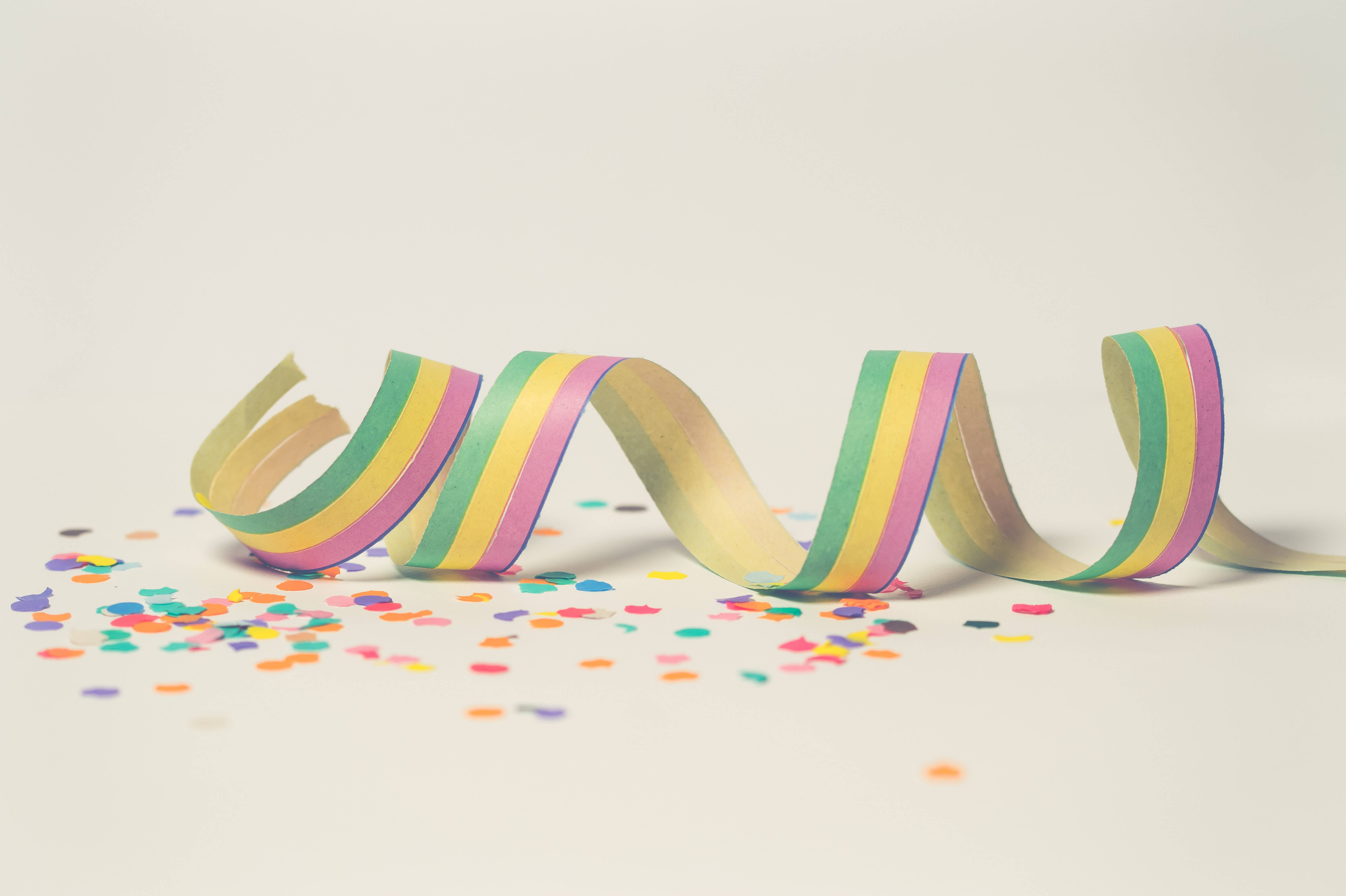rainbow-colored spiral party streamer, multicolored confetti, coiled, 5K Desktop Wallpaper