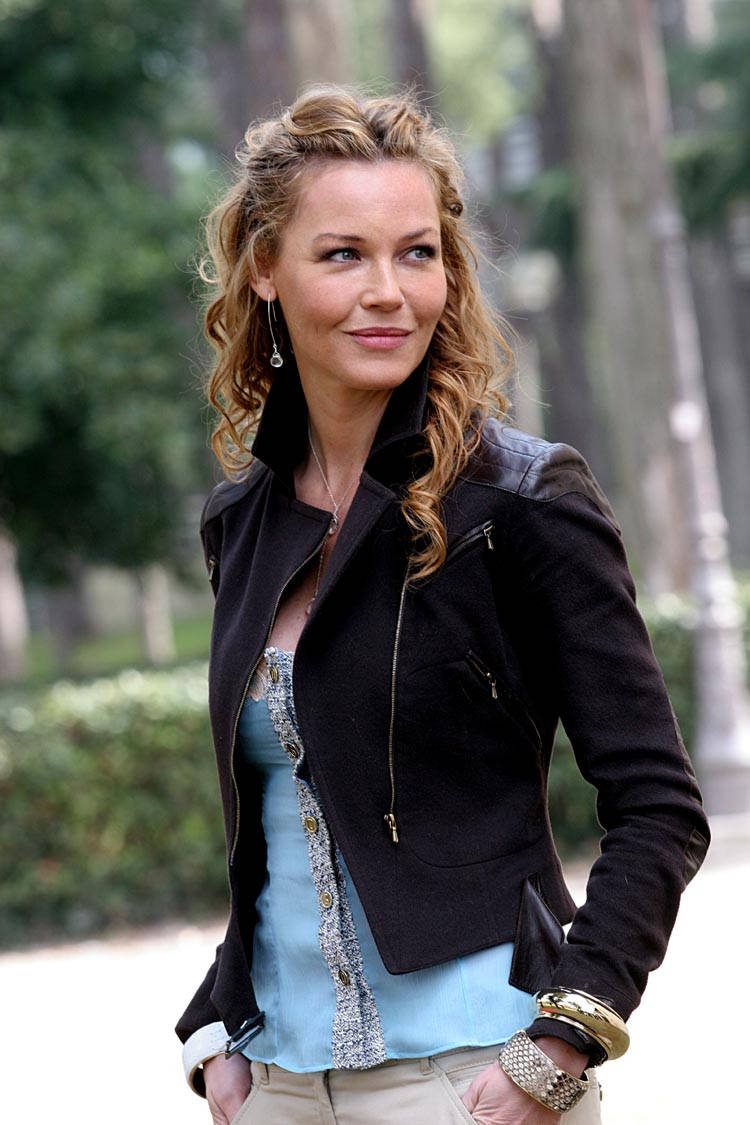 Connie Nielsen, black jacket, curly blonde hair, SD Phone Wallpaper