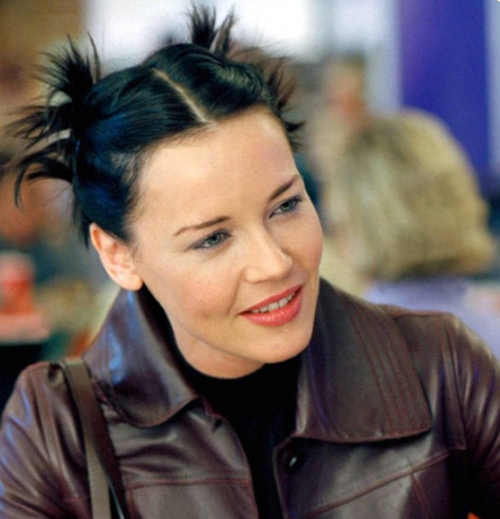 Connie Nielsen, black haired, messy twin buns, SD Phone Wallpaper