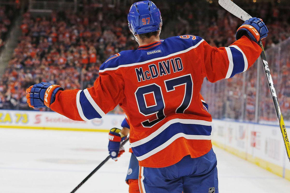 Connor McDavid, number 97, orange blue jersey, SD Desktop Wallpaper