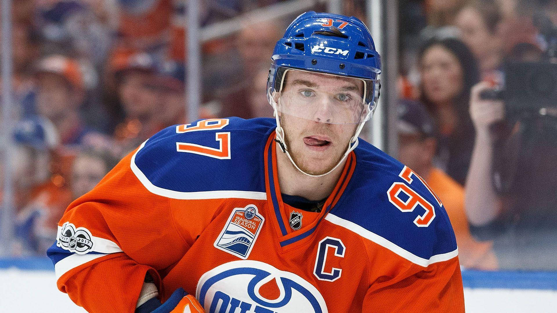 Connor Mcdavid, orange and blue jersey, captain's 'C', Full HD Desktop Wallpaper