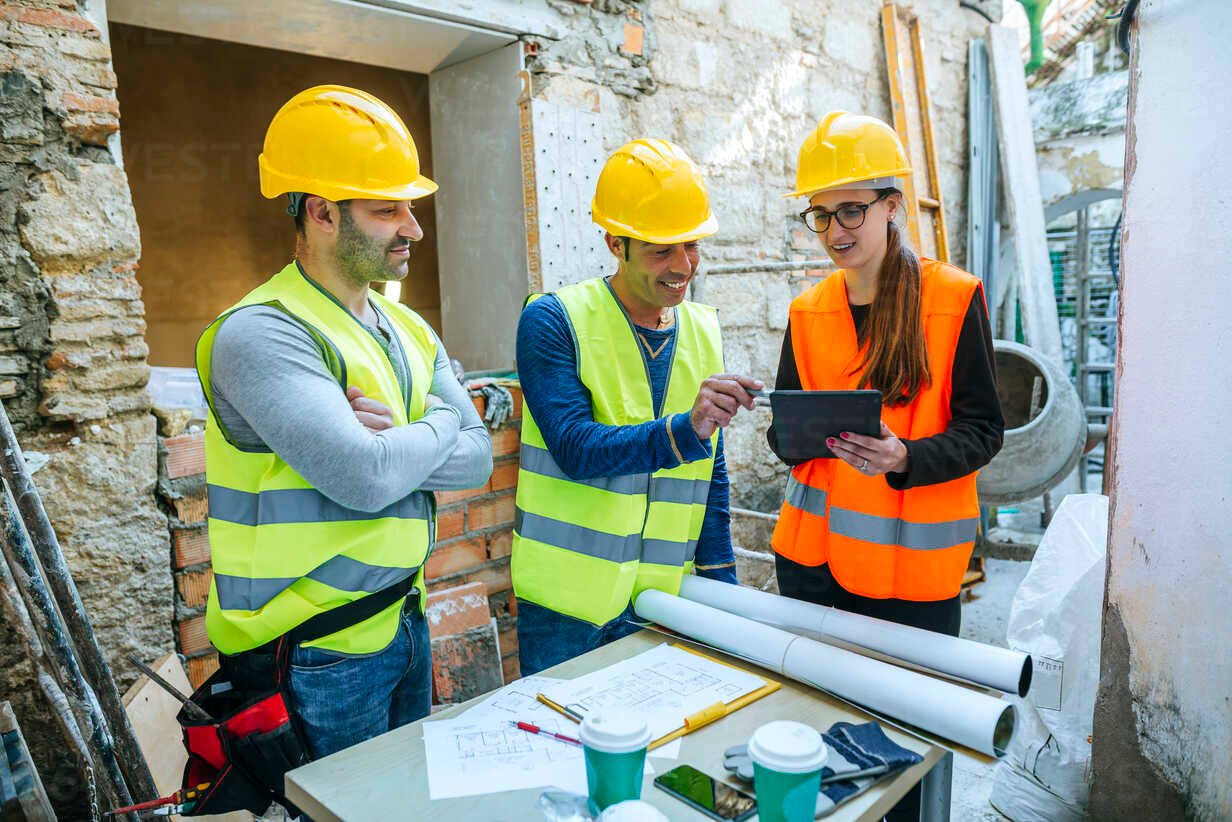 yellow hard hats, safety vests, blueprints, SD Desktop Wallpaper