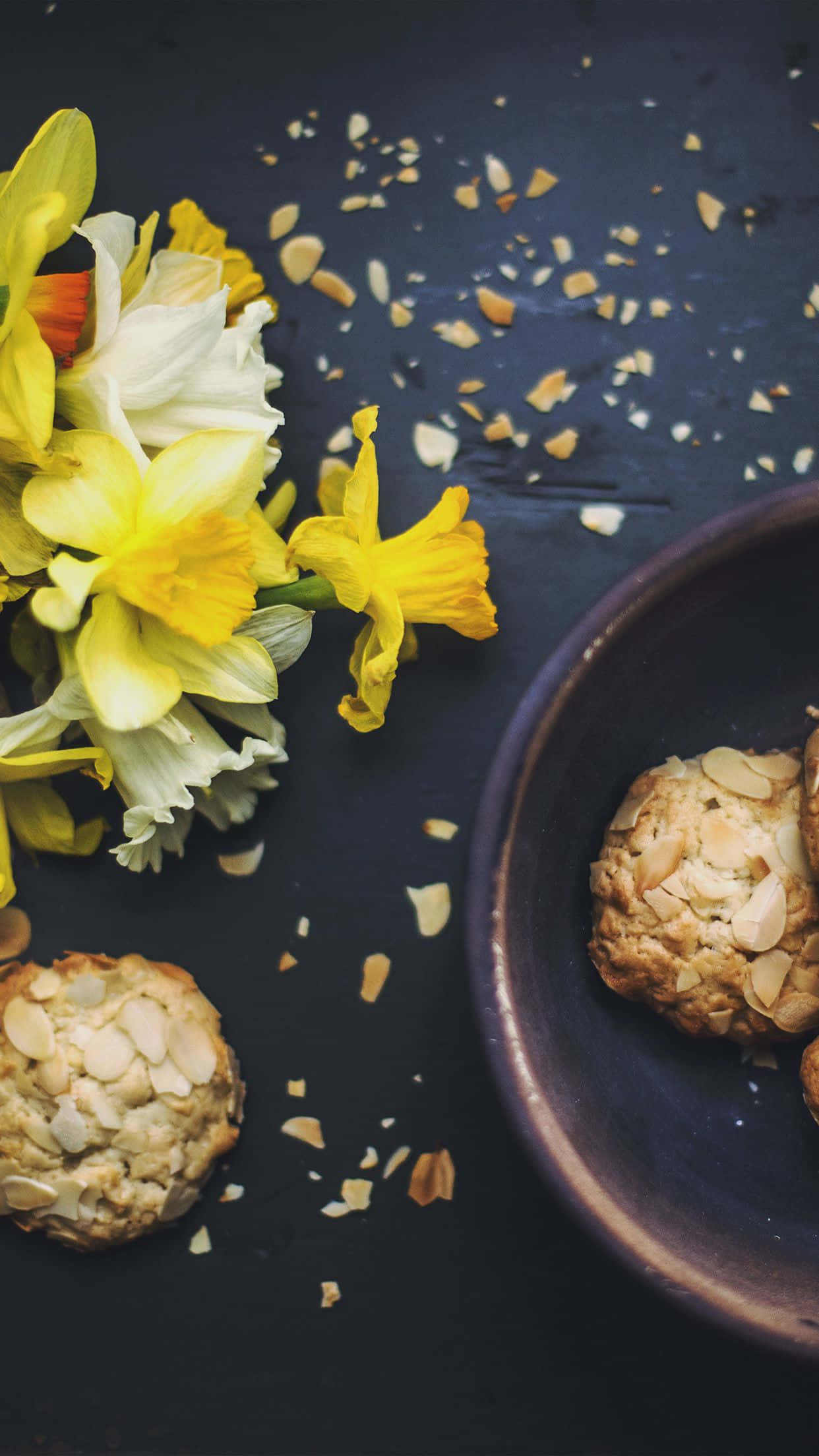 Golden daffodils, almond cookies, dark rustic surface, Full HD Phone Wallpaper
