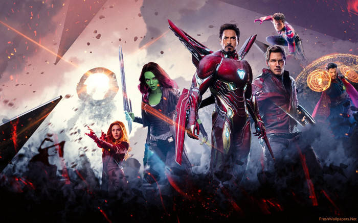 Avengers, fiery battle scene, glowing energy effects, SD Desktop Wallpaper