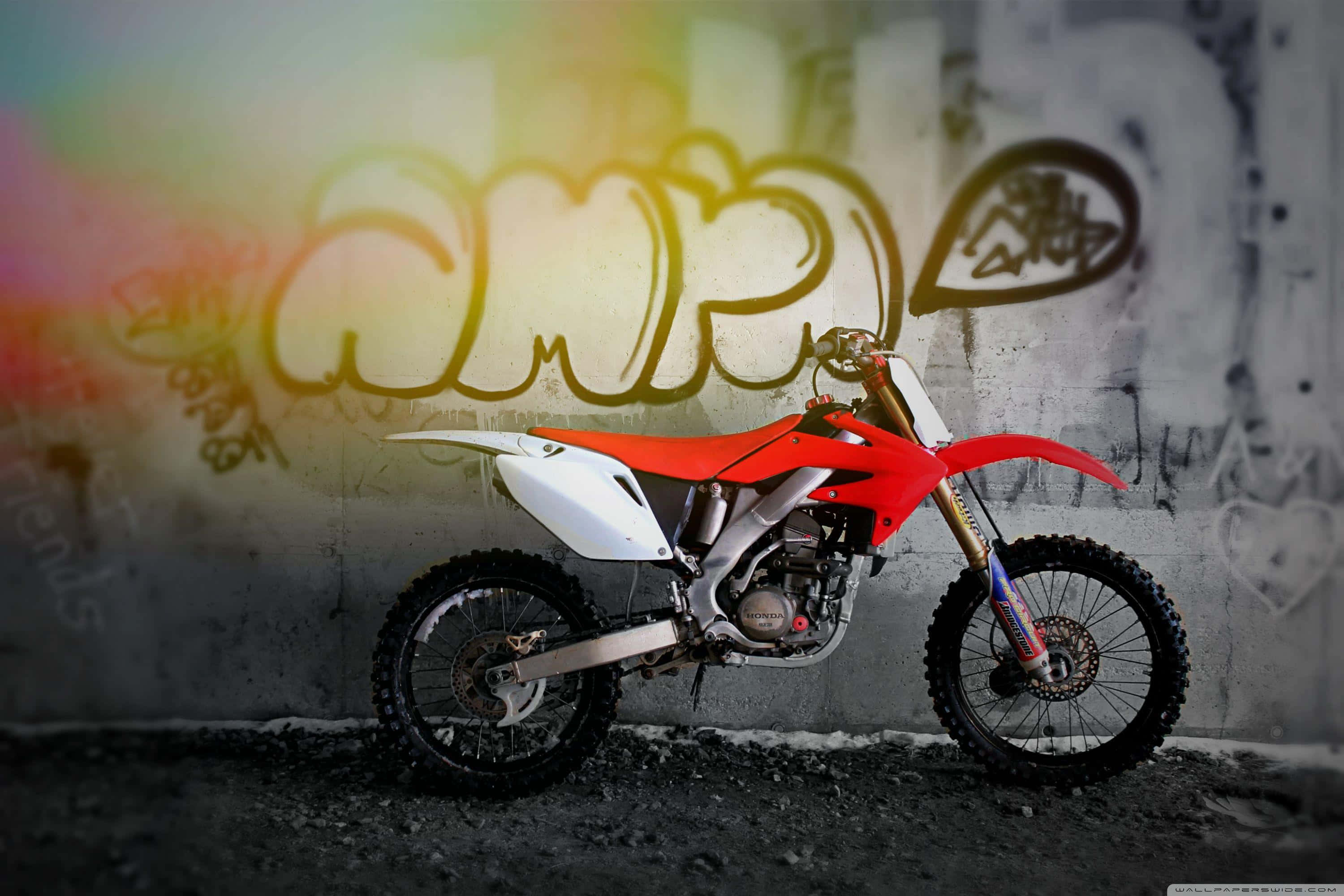 honda crf250r, red and white, graffiti-covered concrete wall, 2K Desktop Wallpaper