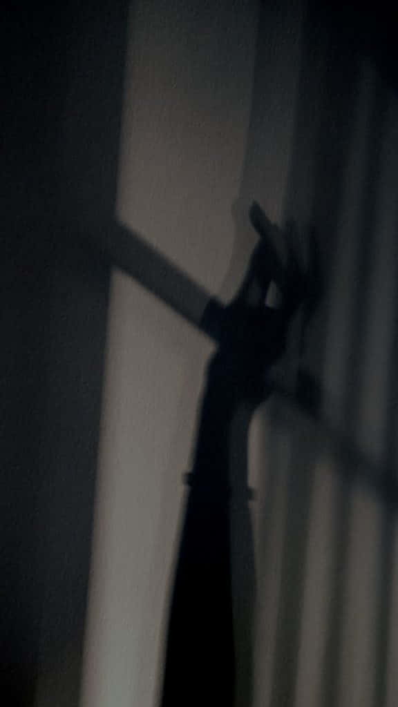 hand, vertical surface, dimly lit wall, SD Phone Wallpaper