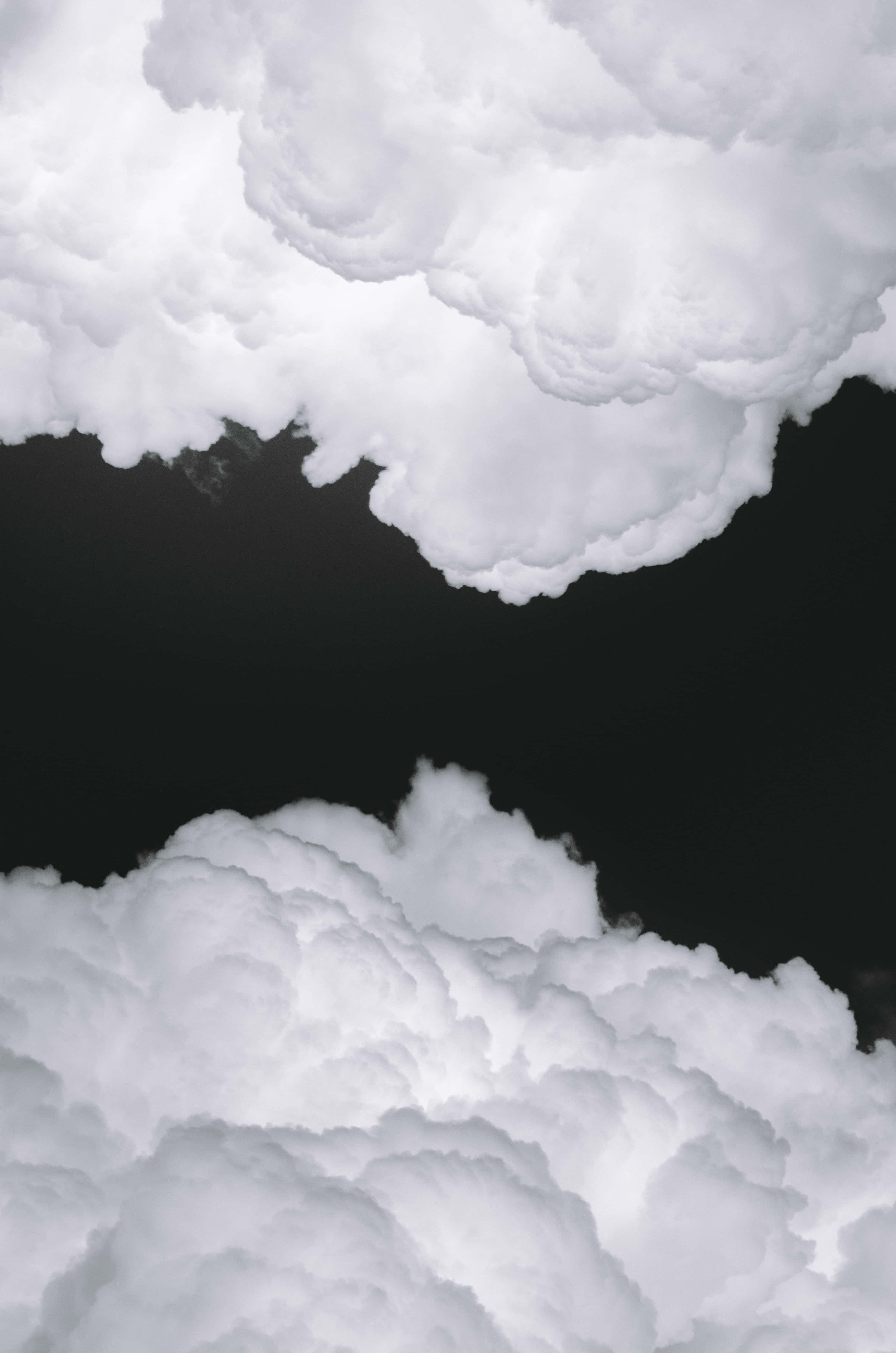 stark black sky, voluminous white clouds, high-contrast aerial view, 4K Phone Wallpaper