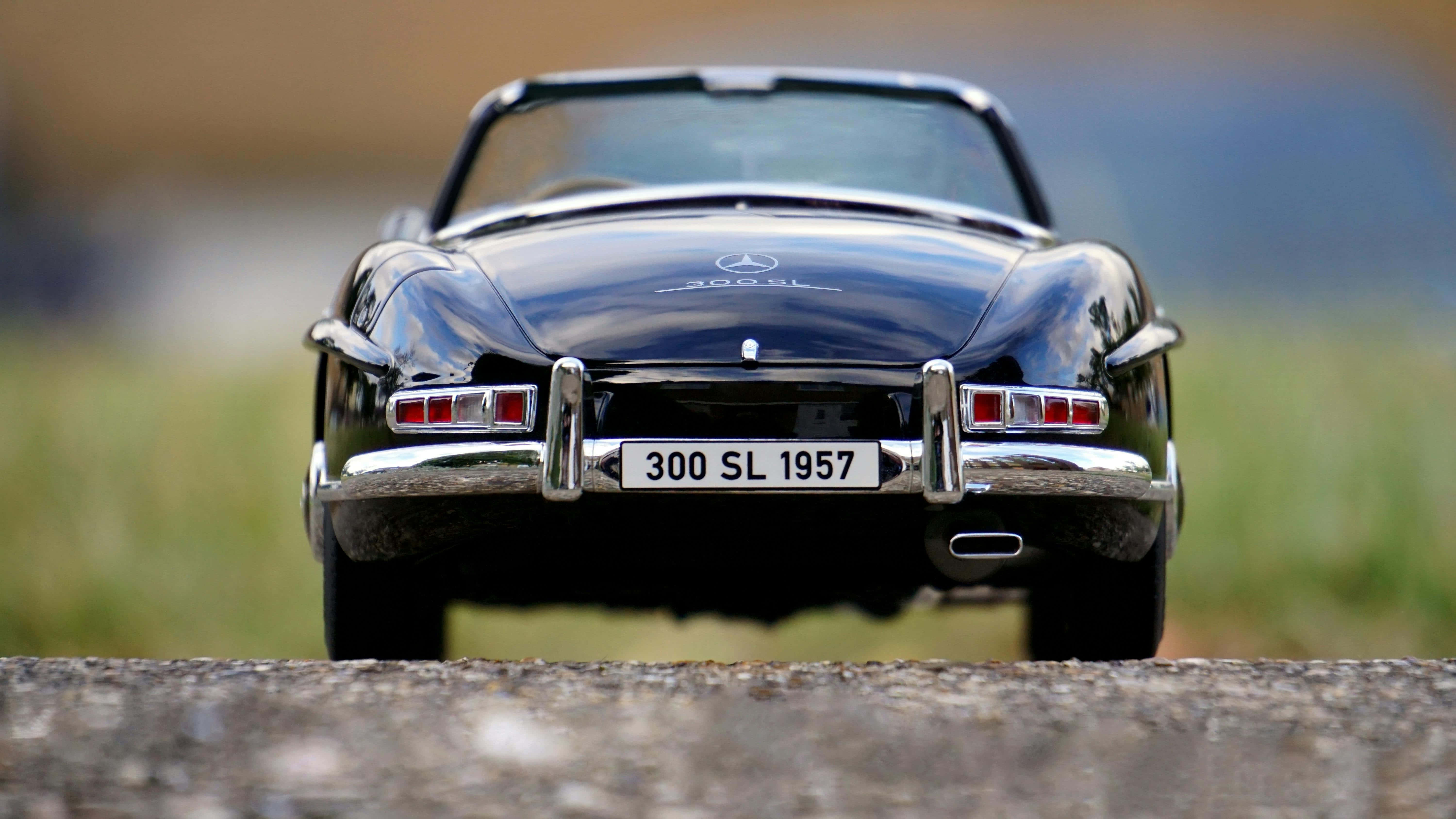 1957 Mercedes 300 SL Gullwing, glossy black, gravel path, 5K Desktop Wallpaper