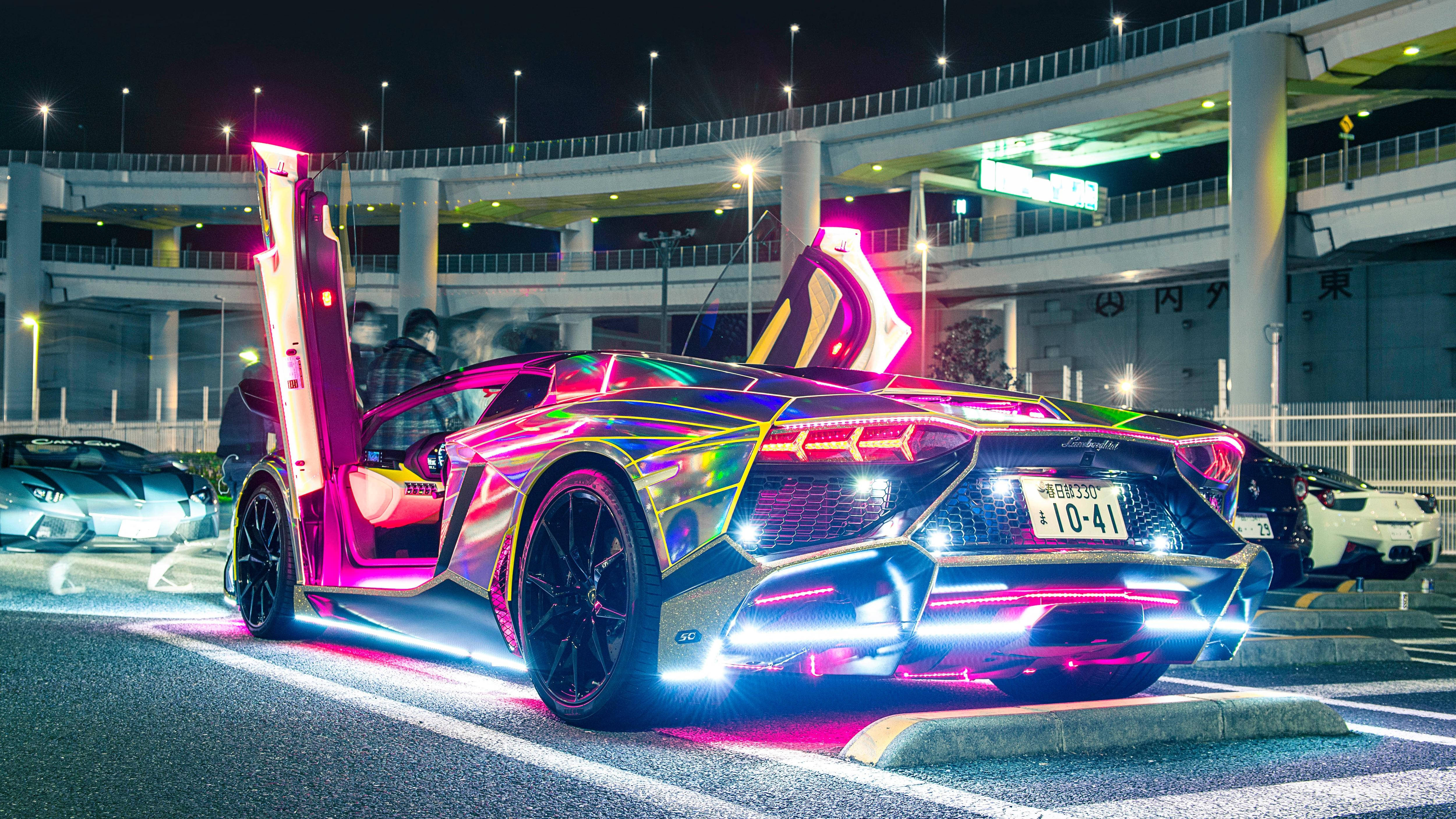 Lamborghini, neon-lit, glowing pink and blue accents, 4K Desktop Wallpaper