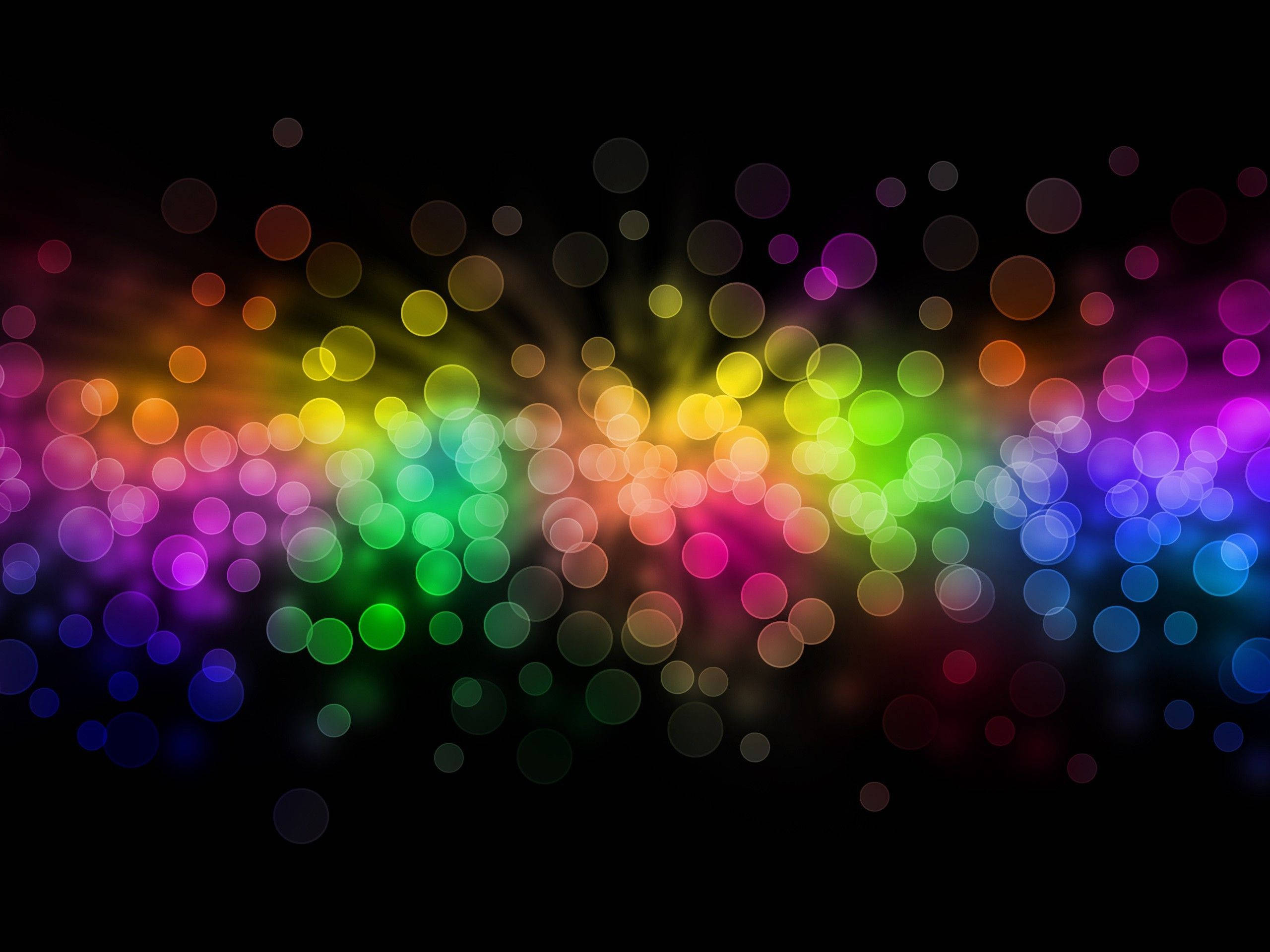 Vibrant rainbow bokeh lights, black background, dazzling abstract glow, 2K Desktop Wallpaper