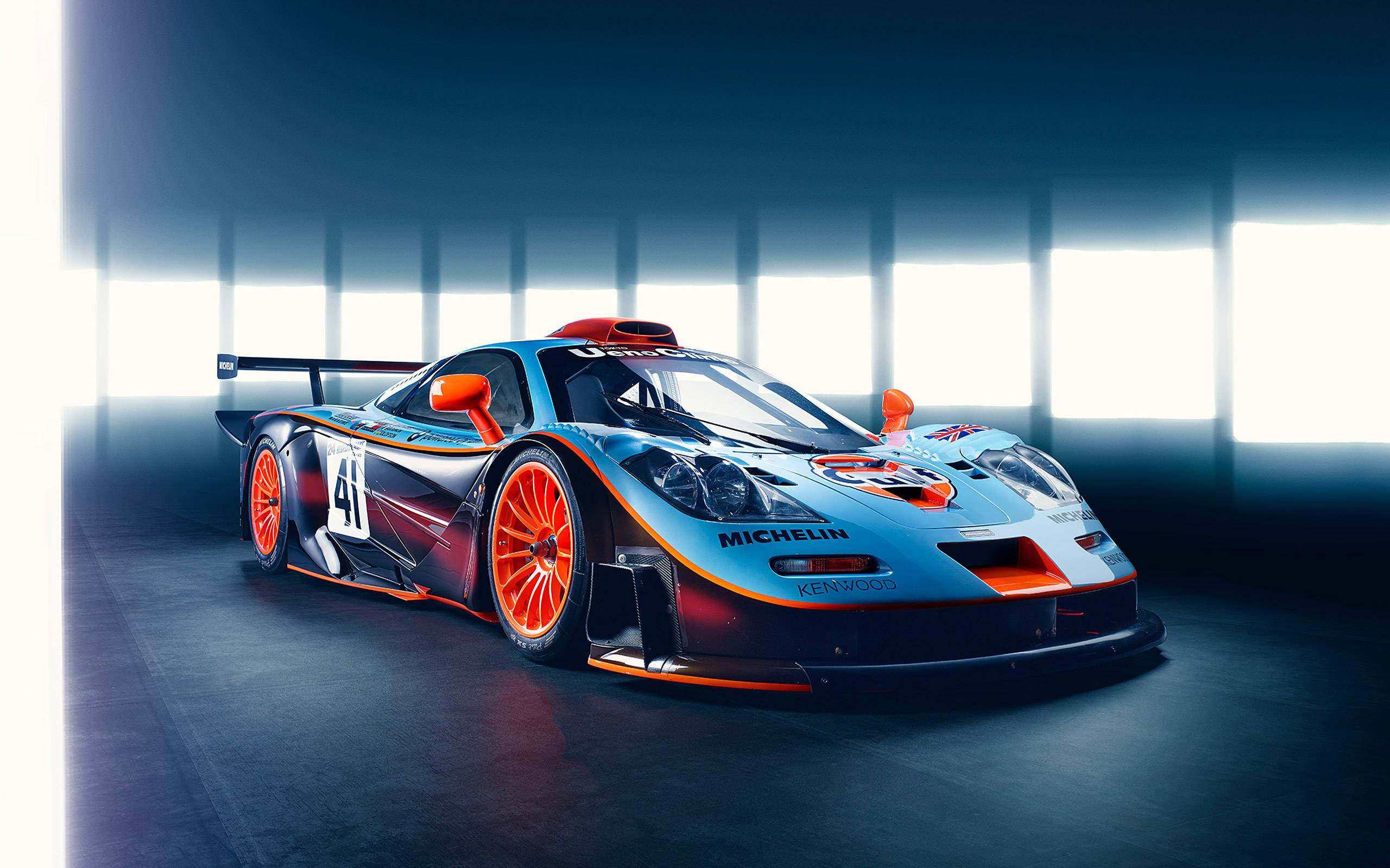 blue and orange race car, number 41, bright studio lights, 2K Desktop Wallpaper