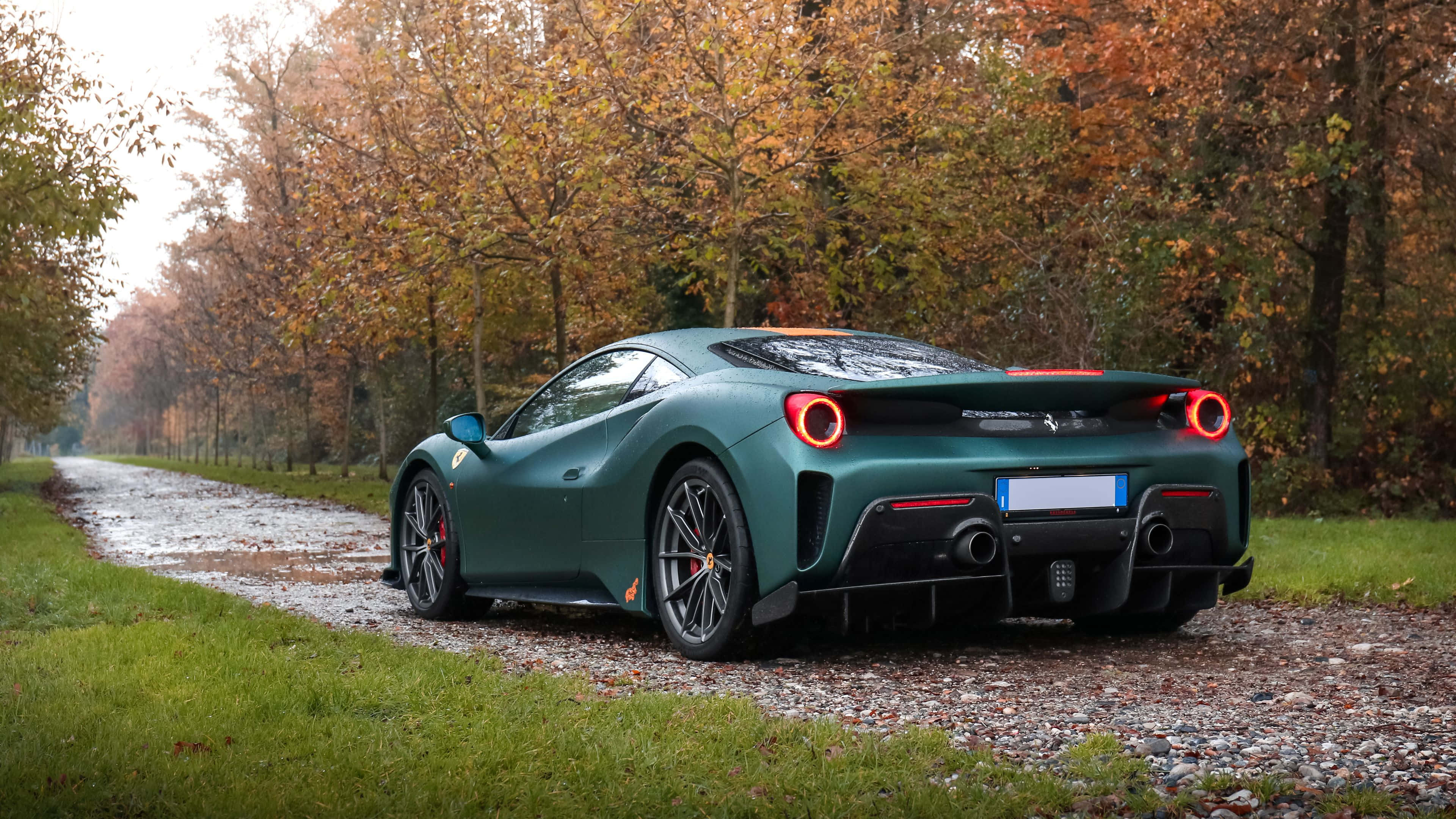 Ferrari, green, glowing red taillights, 4K Desktop Wallpaper