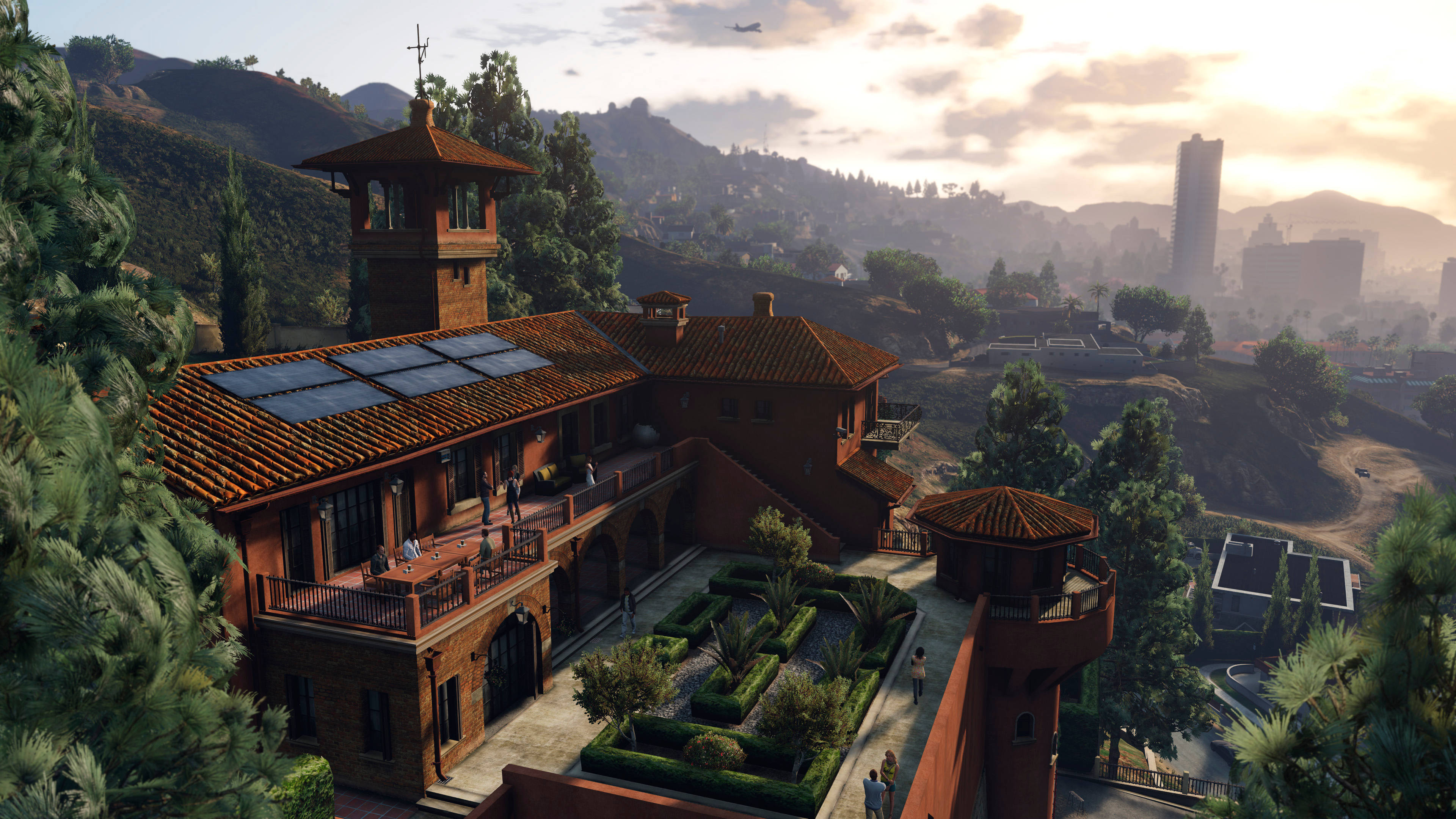 Mediterranean-style villa, terracotta roofs, solar panels, 4K Desktop Wallpaper