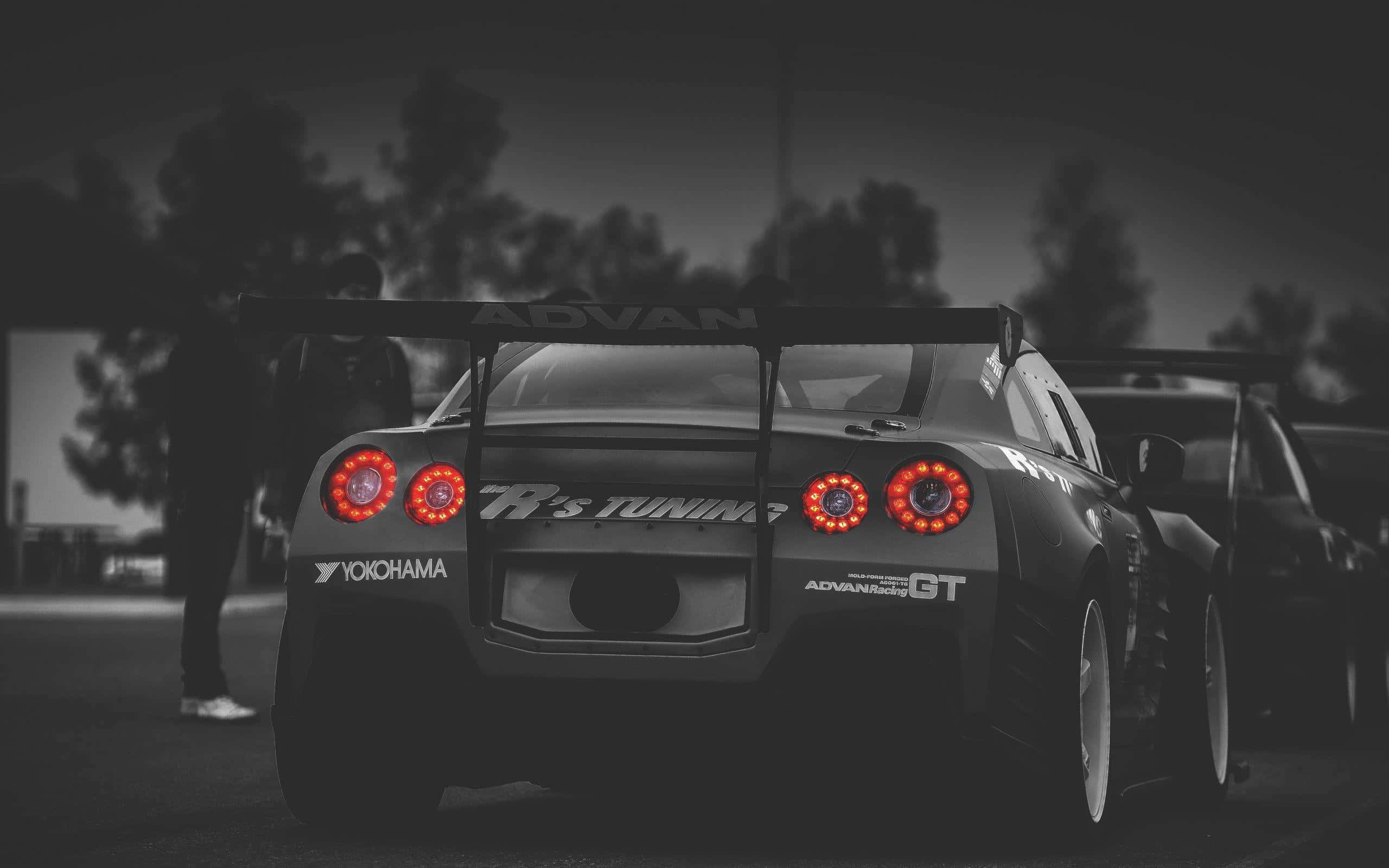 GTR, black, glowing red taillights, 2K Desktop Wallpaper