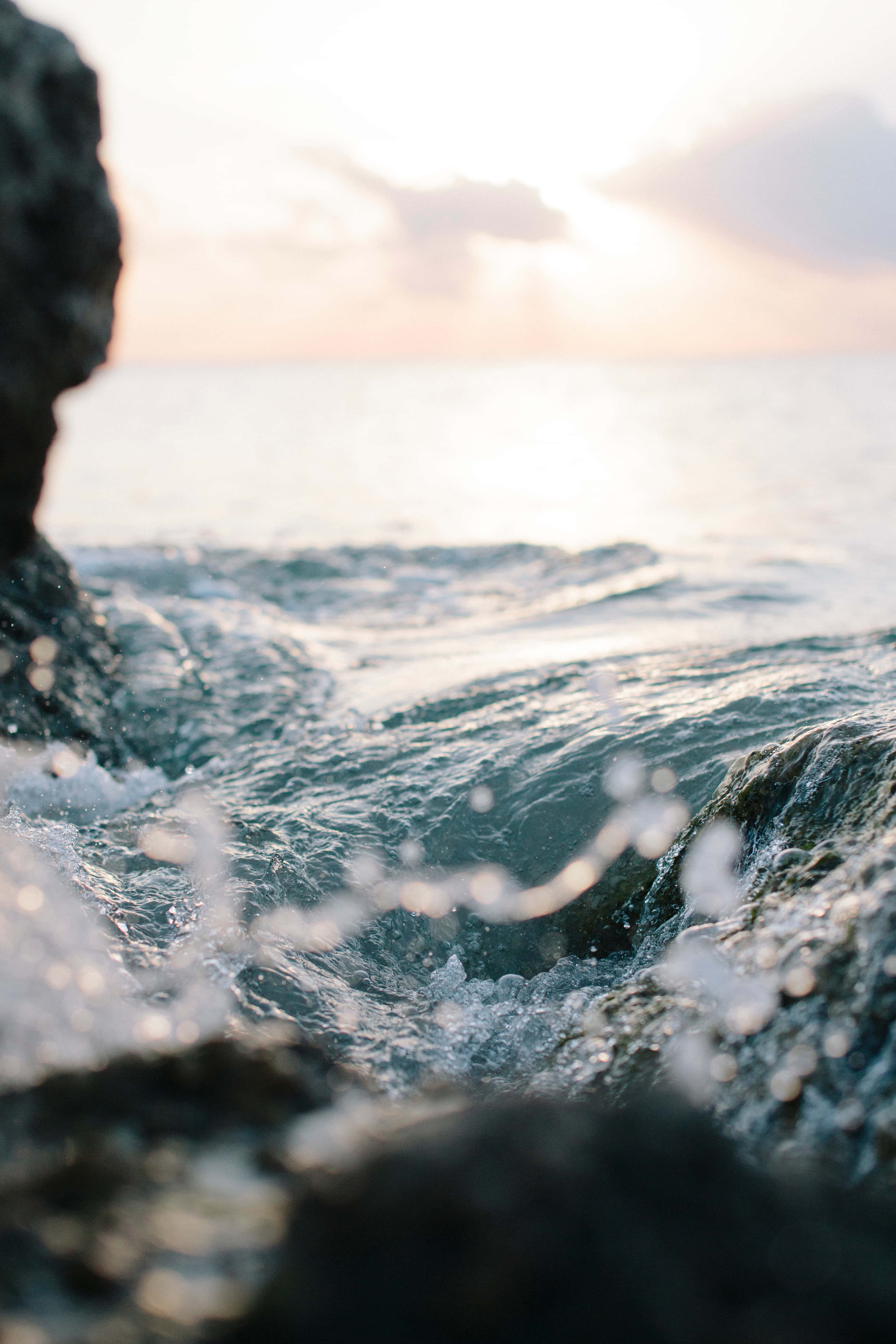Sunset, ocean waves, dark wet rocks, 4K Phone Wallpaper