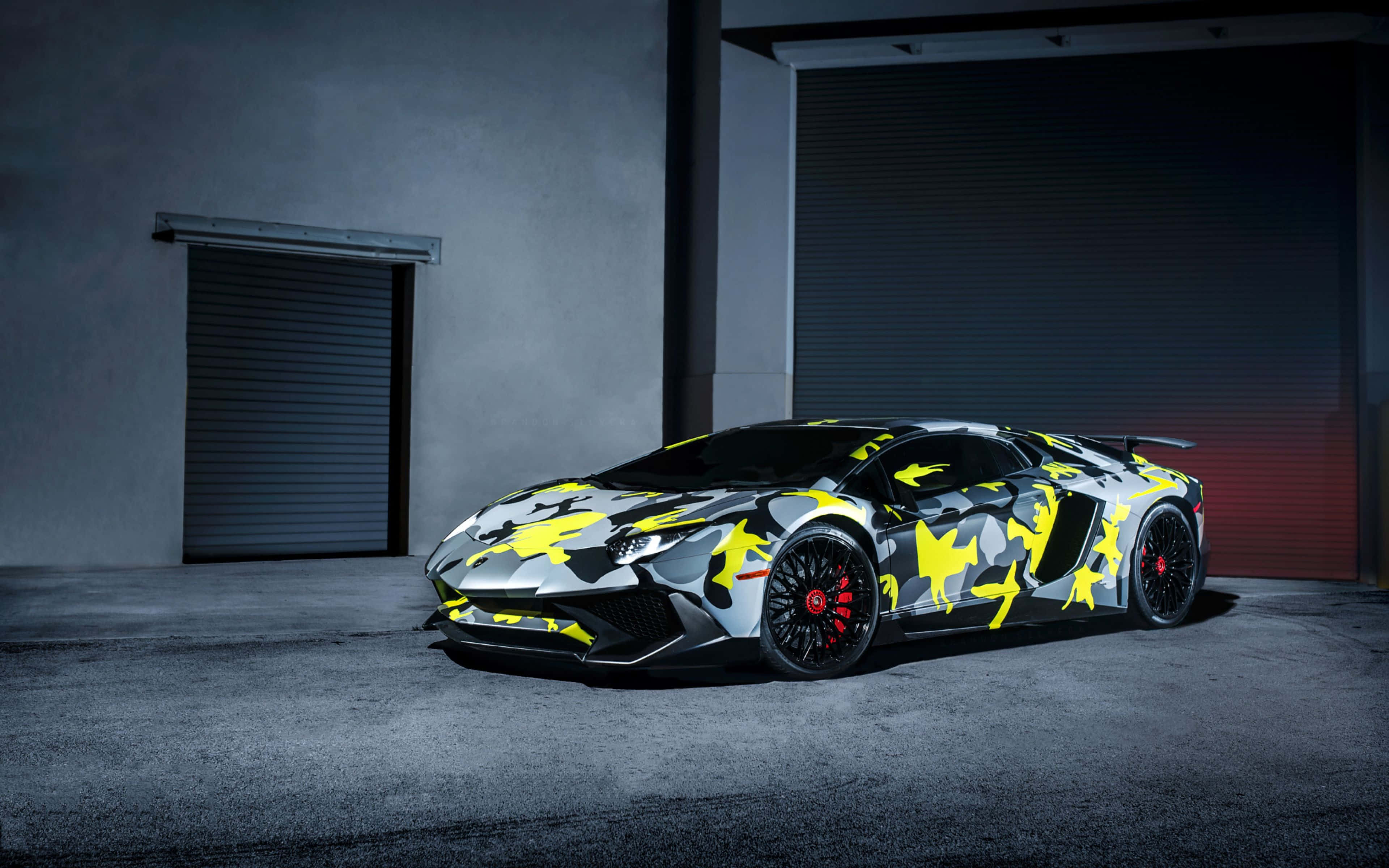 Lamborghini, bold yellow and gray camouflage paint, dimly lit industrial garage, 4K Desktop Wallpaper