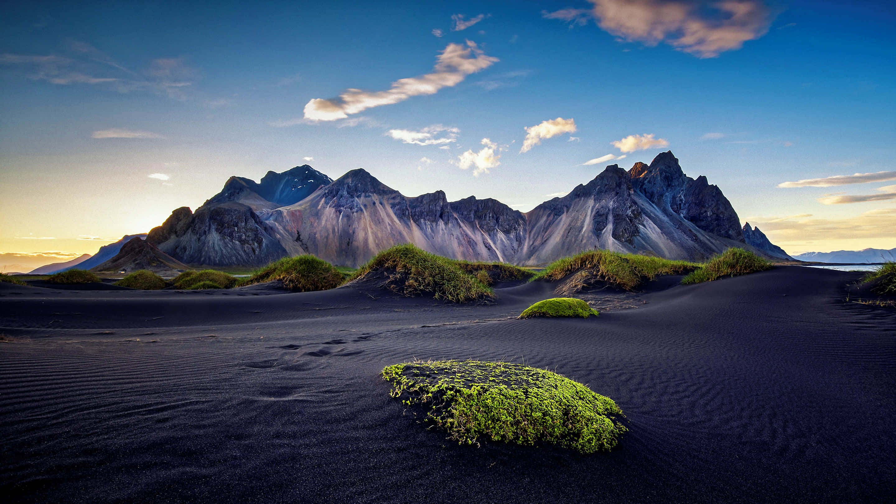 Cool Landscape, black sand beach, vibrant green shrubs, 2K Desktop Wallpaper
