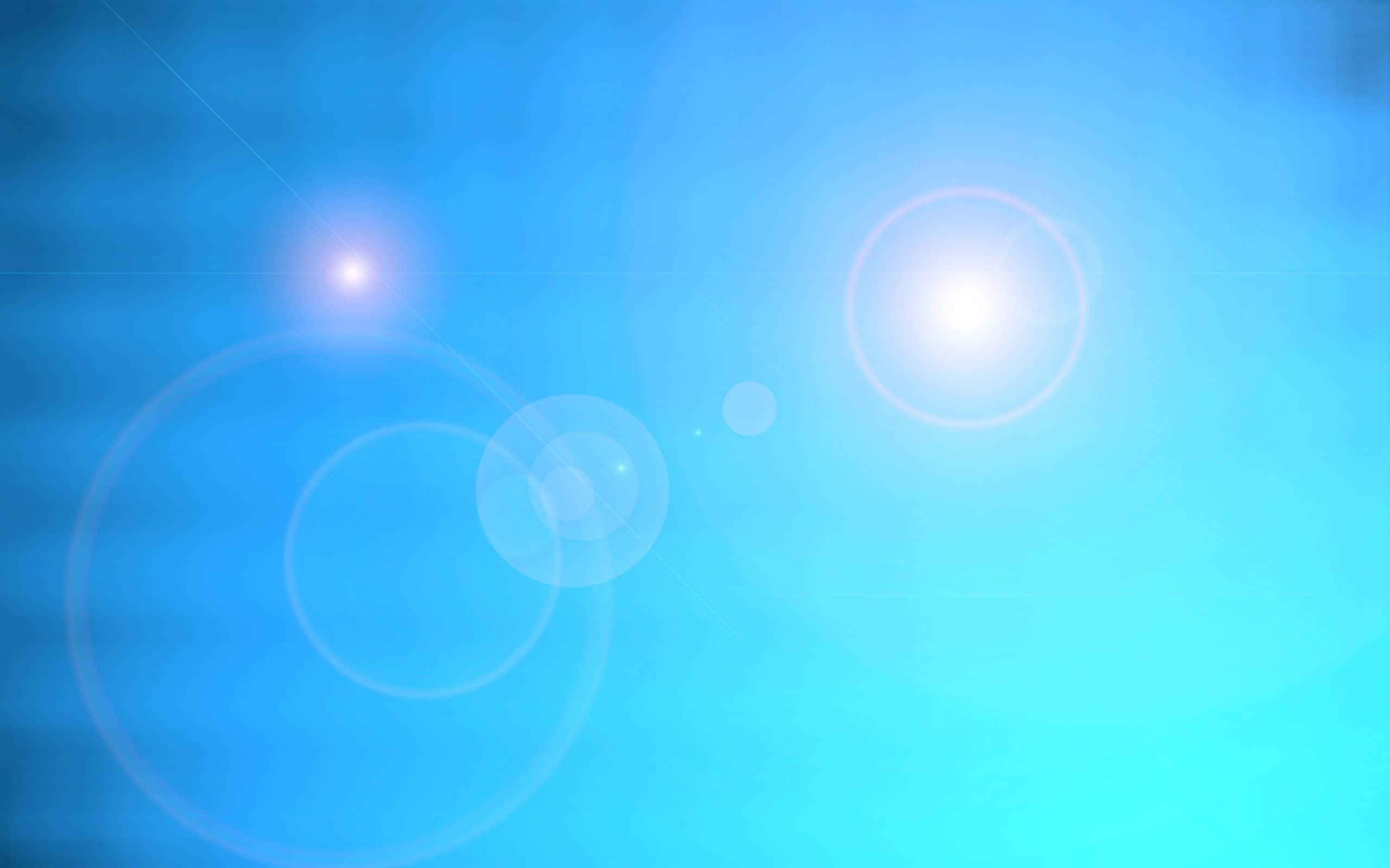light blue, soft blue gradient, glowing lens flares, 2K Desktop Wallpaper