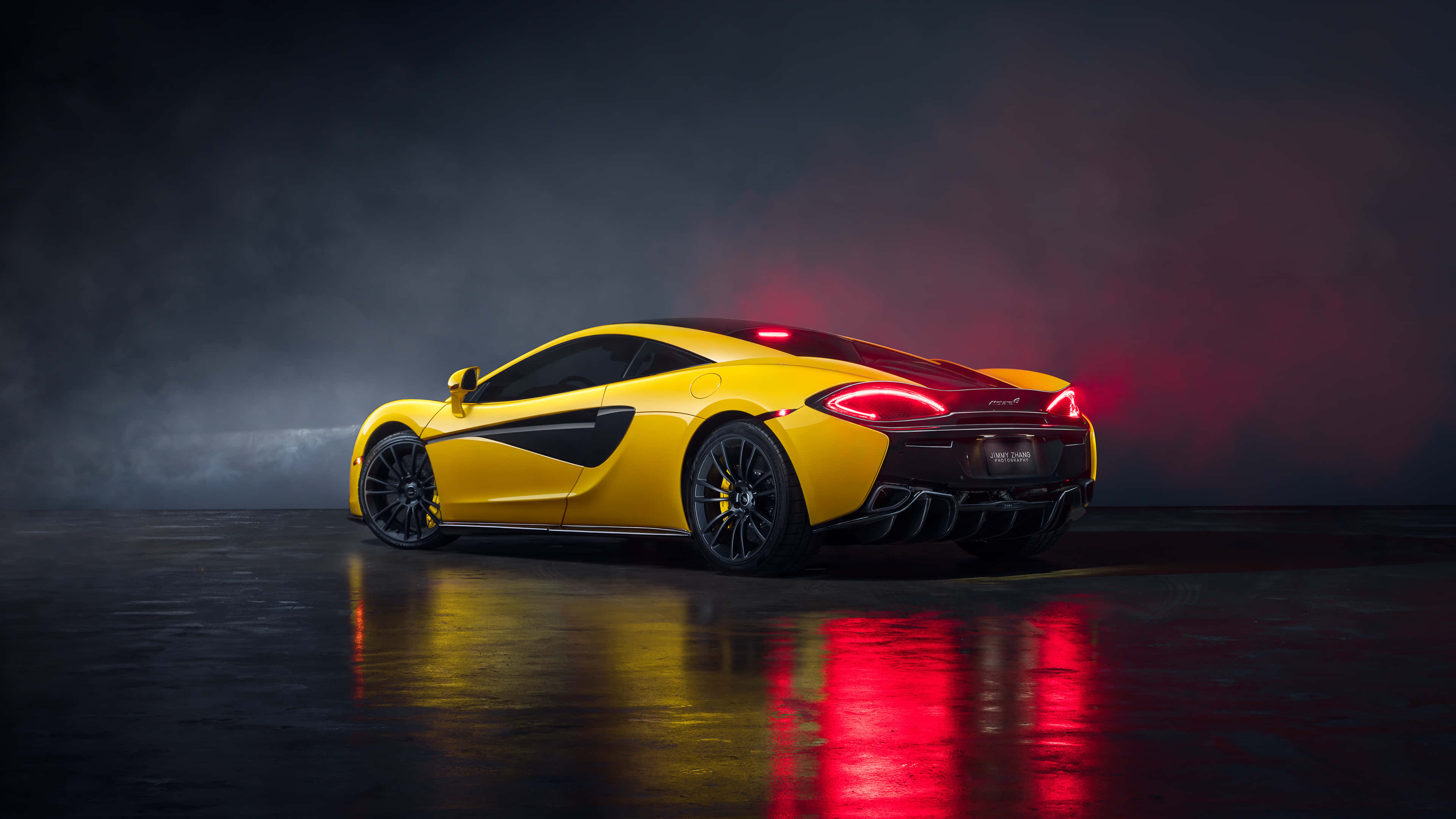 McLaren, vibrant yellow, red taillights, 4K Desktop Wallpaper