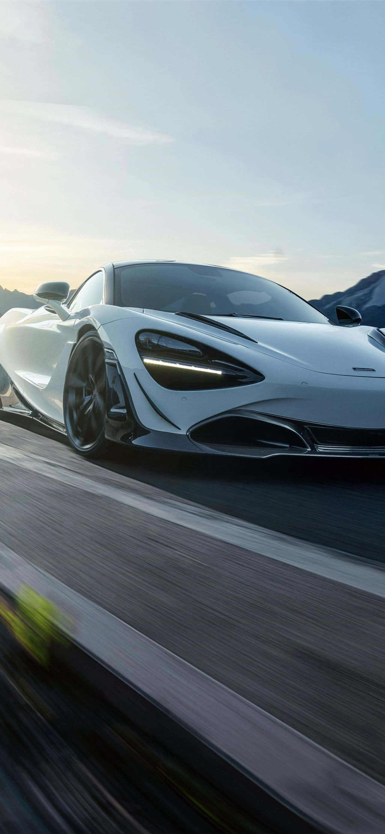 Cool McLaren, sleek white sports car, mountain road, 2K Phone Wallpaper