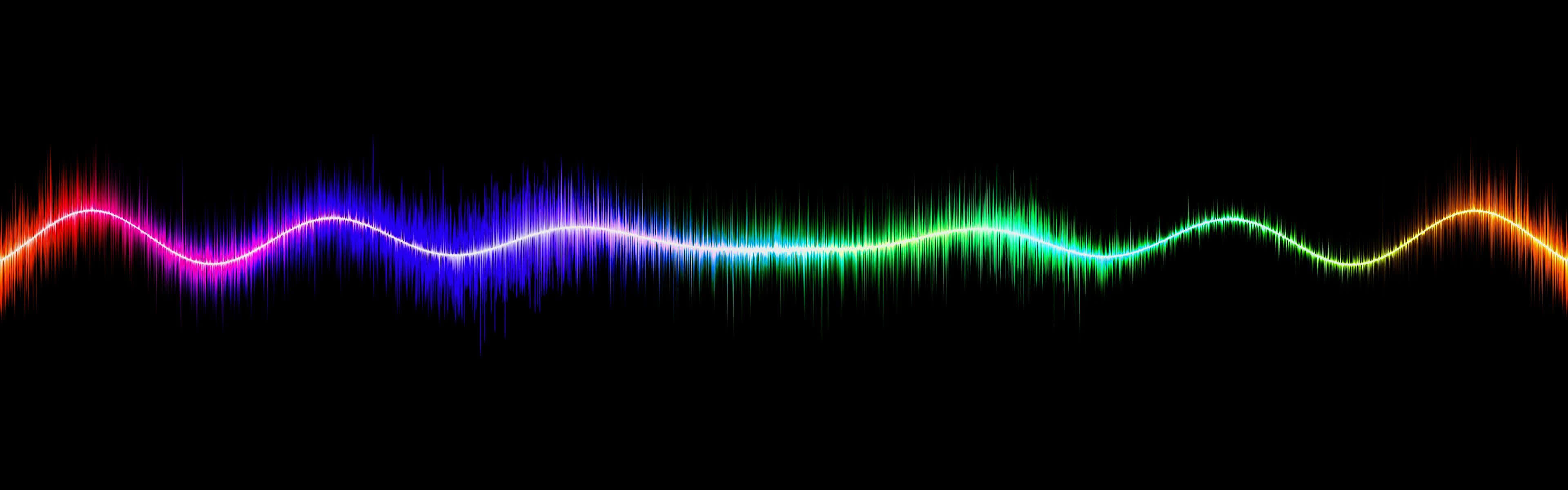 rainbow audio waveform, black background, glowing peaks and valleys, 4K Desktop Wallpaper